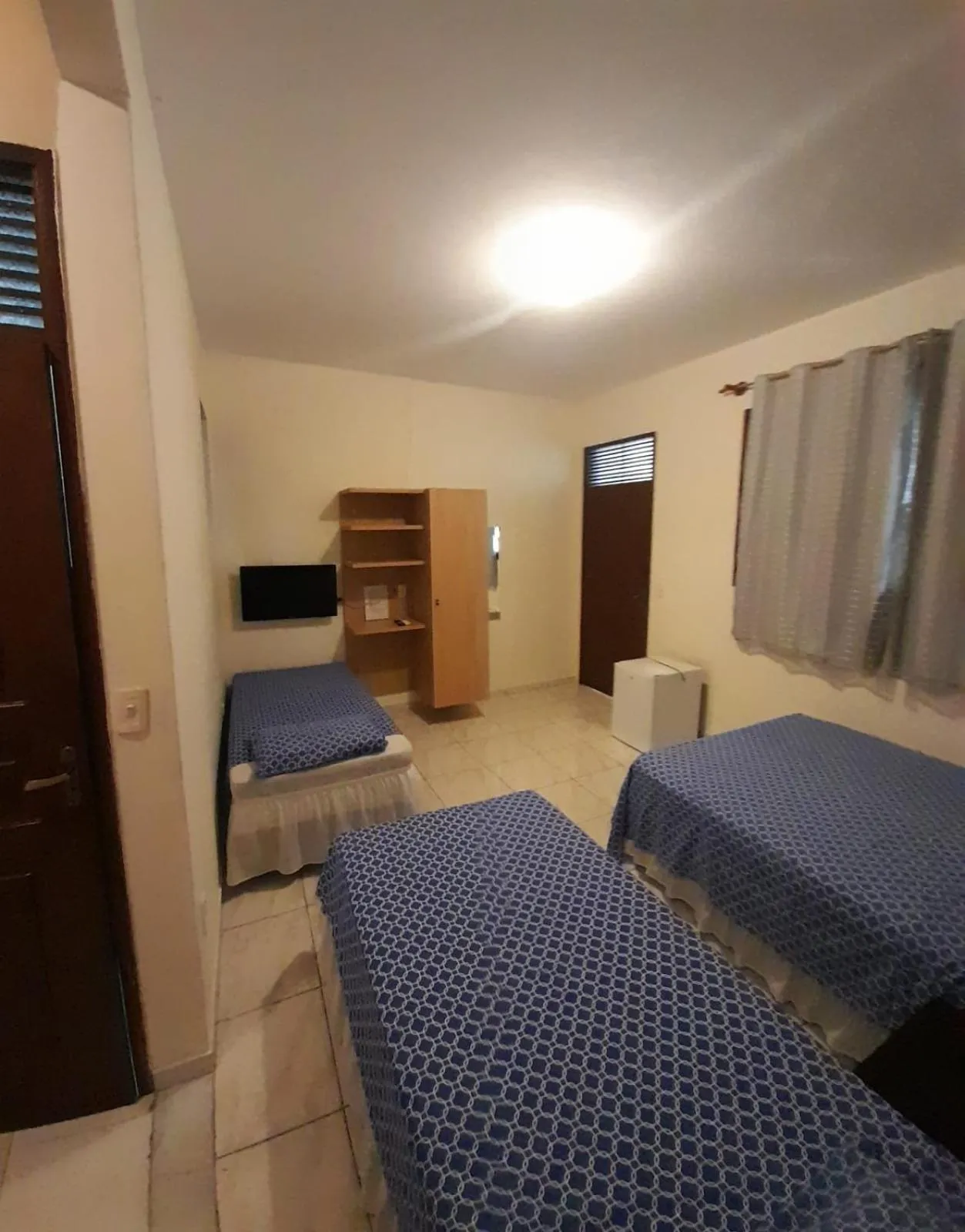 Bed in Pousada Casarão 2030