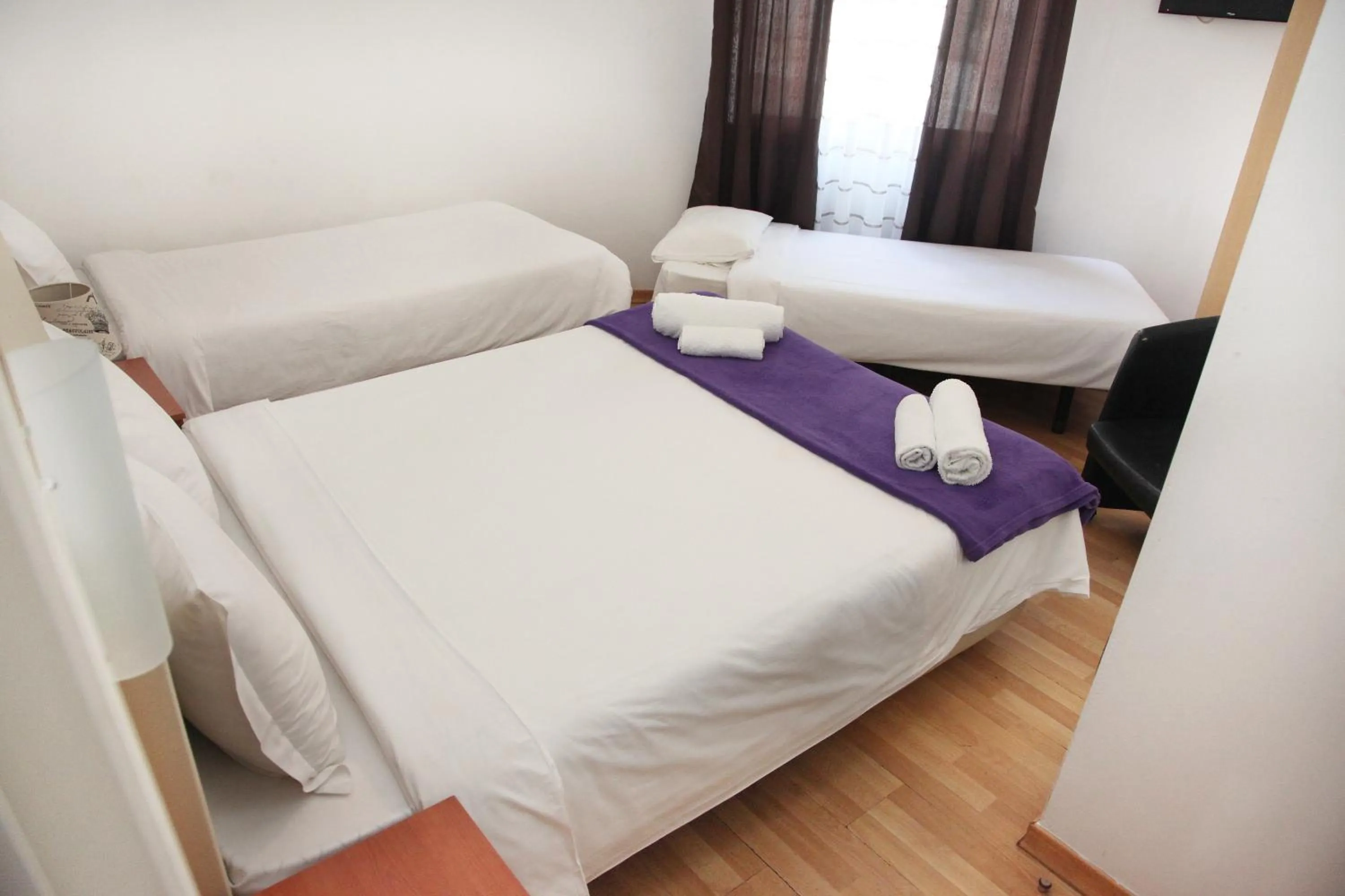 Bed in Lisbon Suite Home