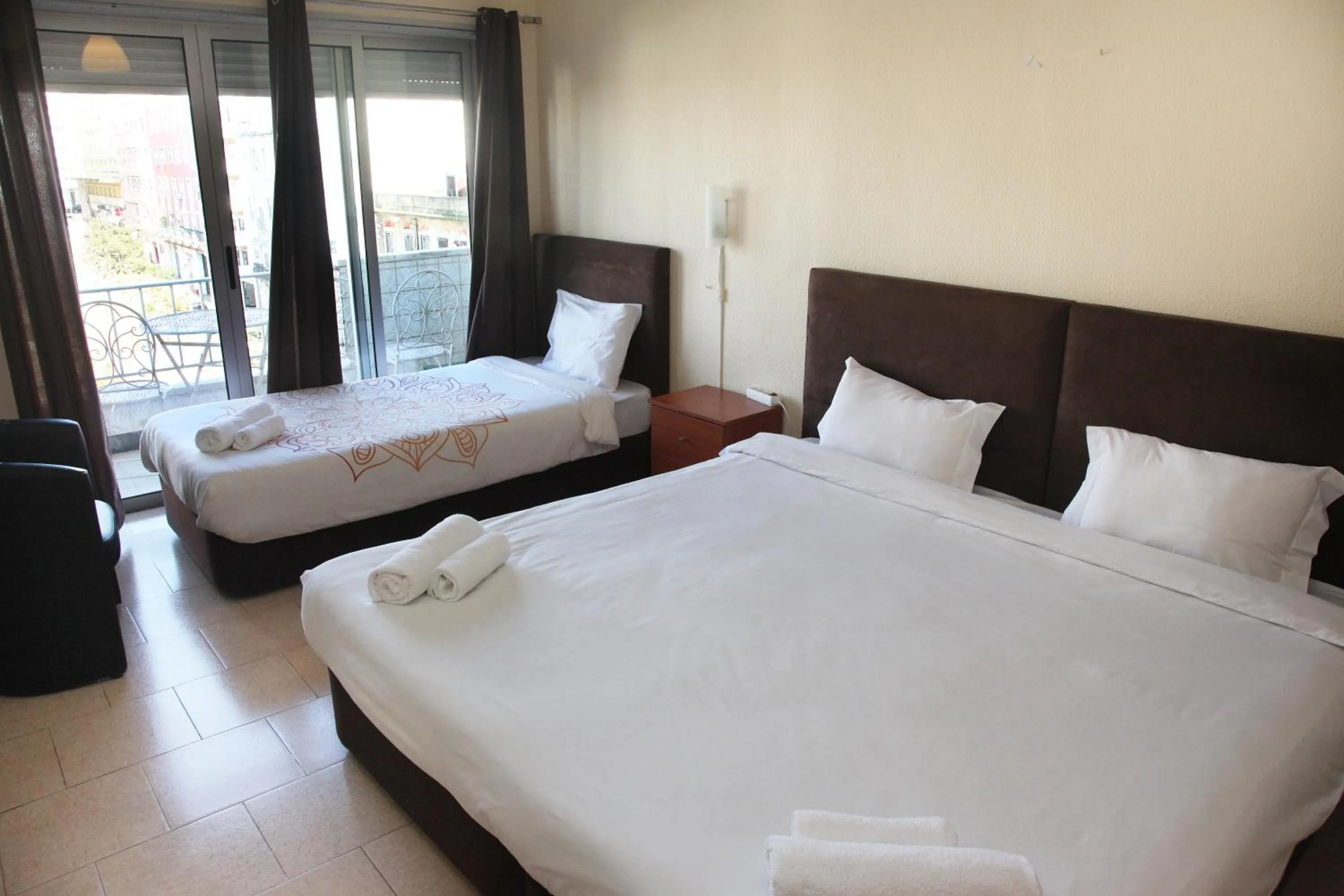 Bed in Lisbon Suite Home