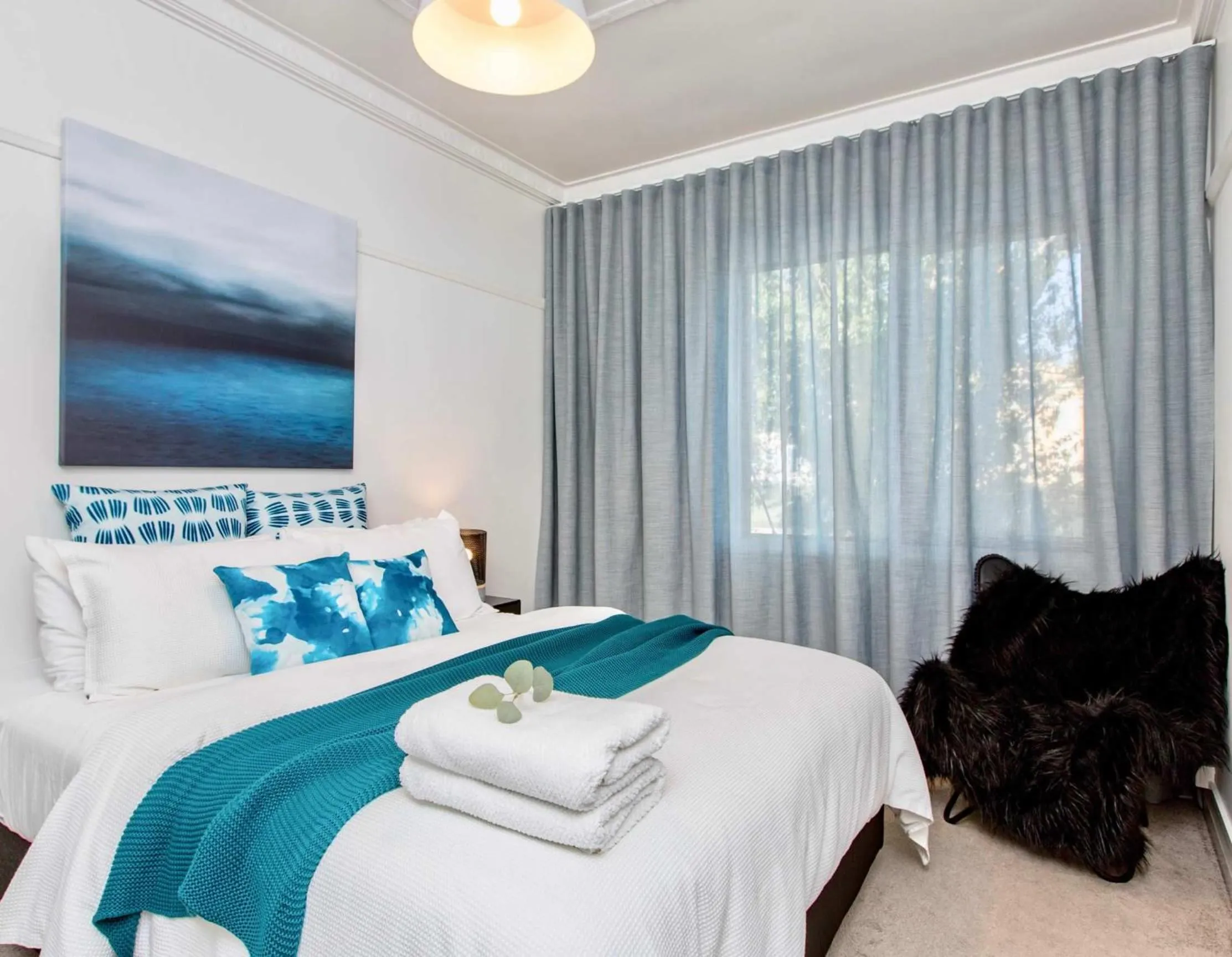 Bed in The Baylis Boutique Apartments
