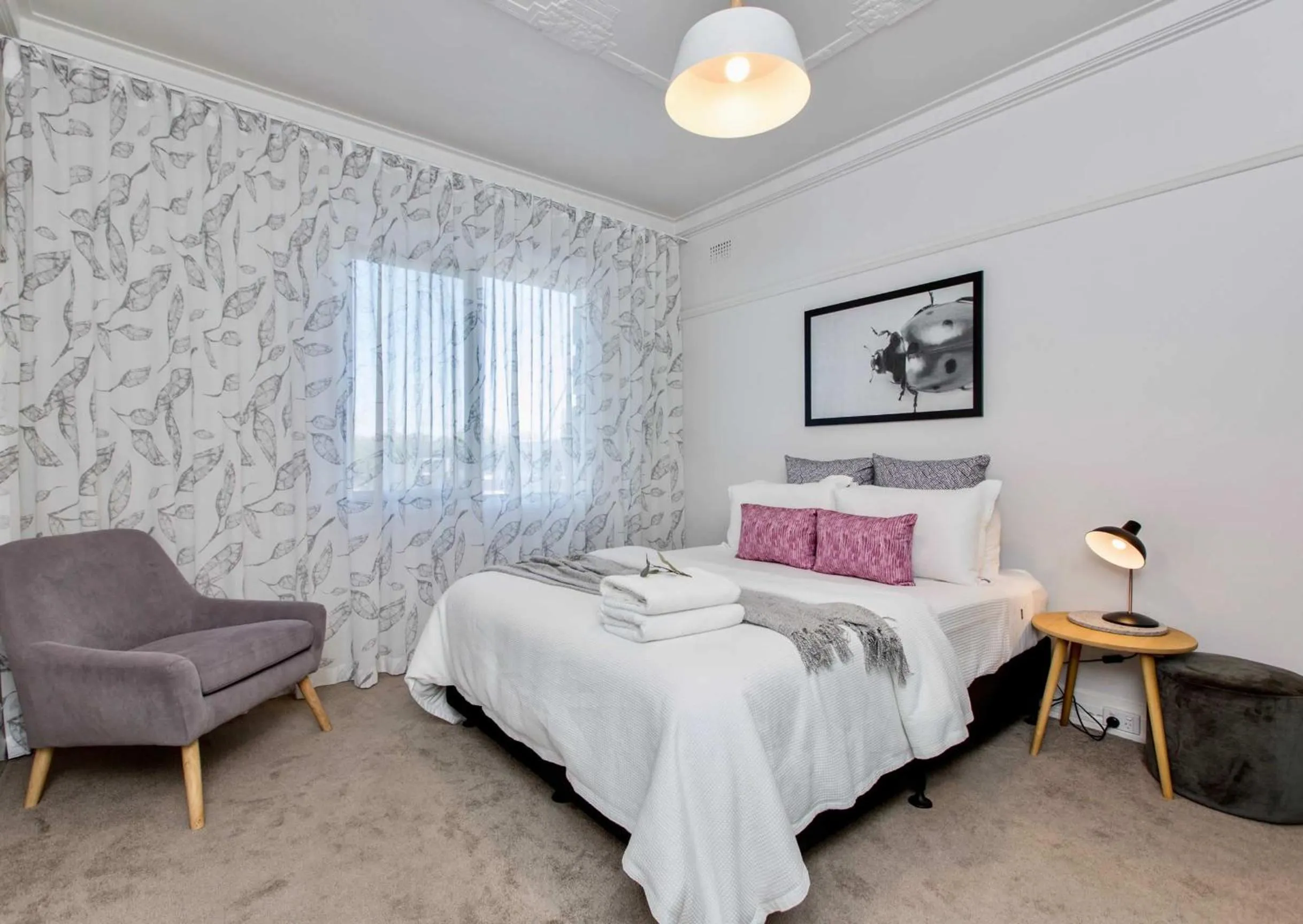 Bed in The Baylis Boutique Apartments