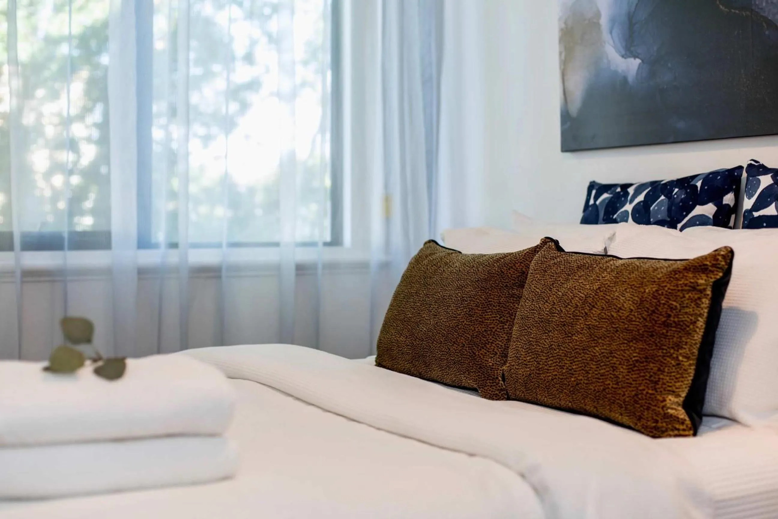Bed in The Baylis Boutique Apartments