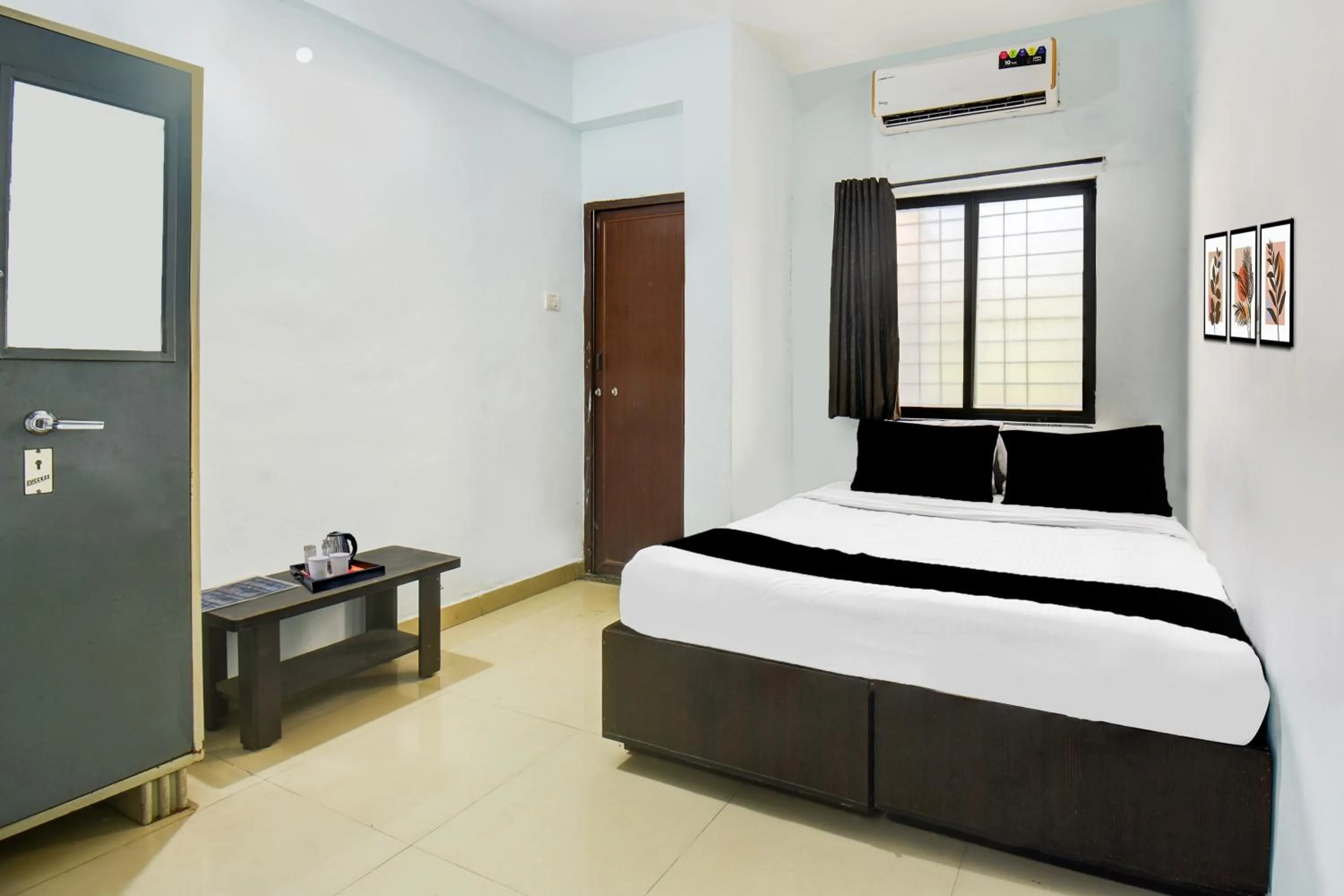 Bedroom, Bed in Hotel O Western Avenue Pune Formerly Happy Stay