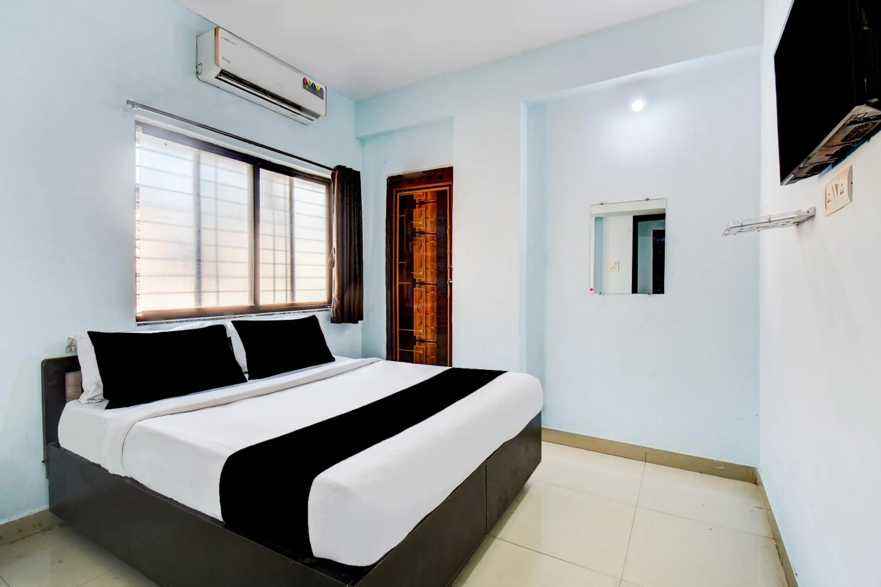 Bedroom, Bed in Hotel O Western Avenue Pune Formerly Happy Stay
