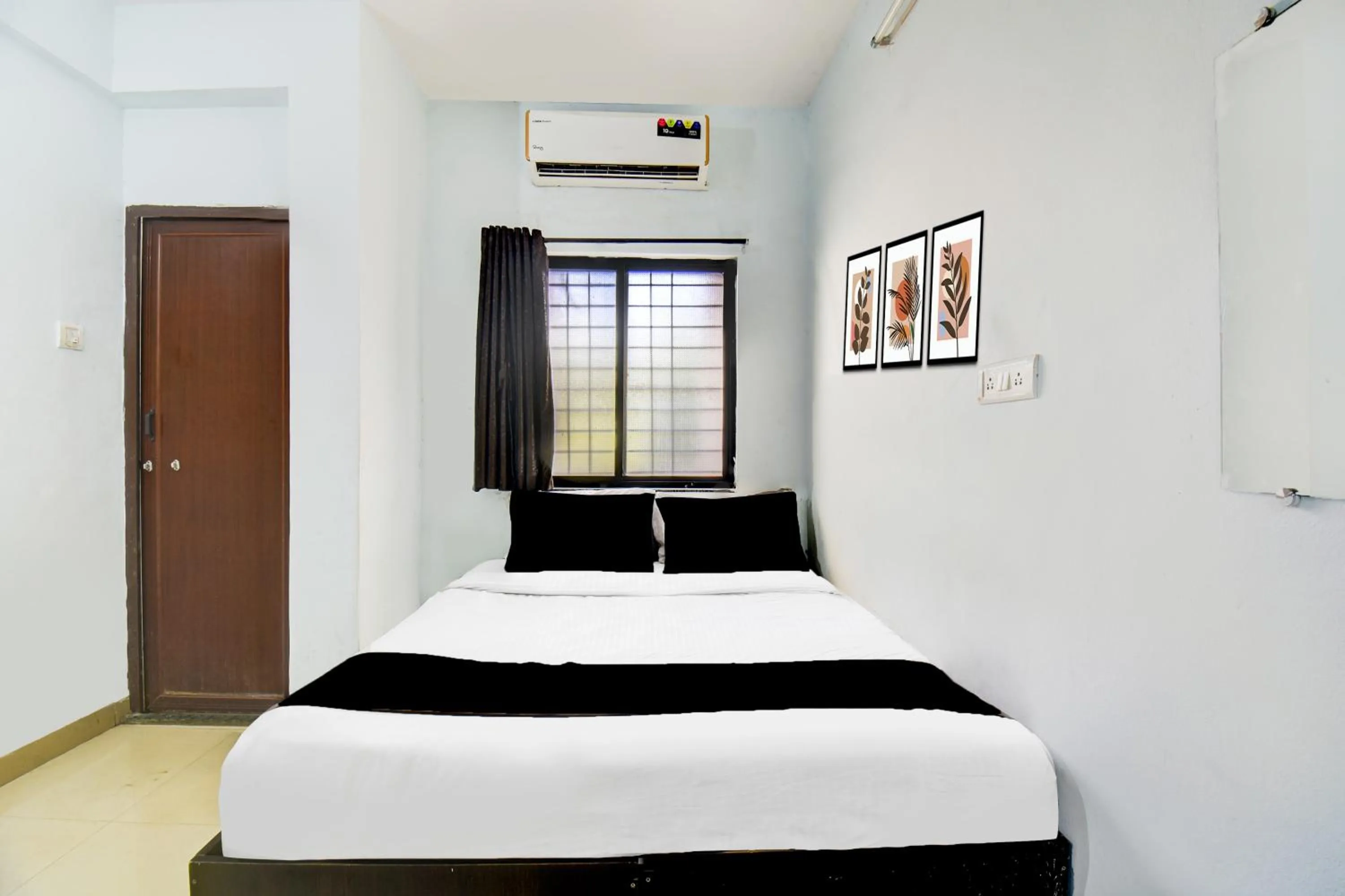 Bedroom, Bed in Hotel O Western Avenue Pune Formerly Happy Stay