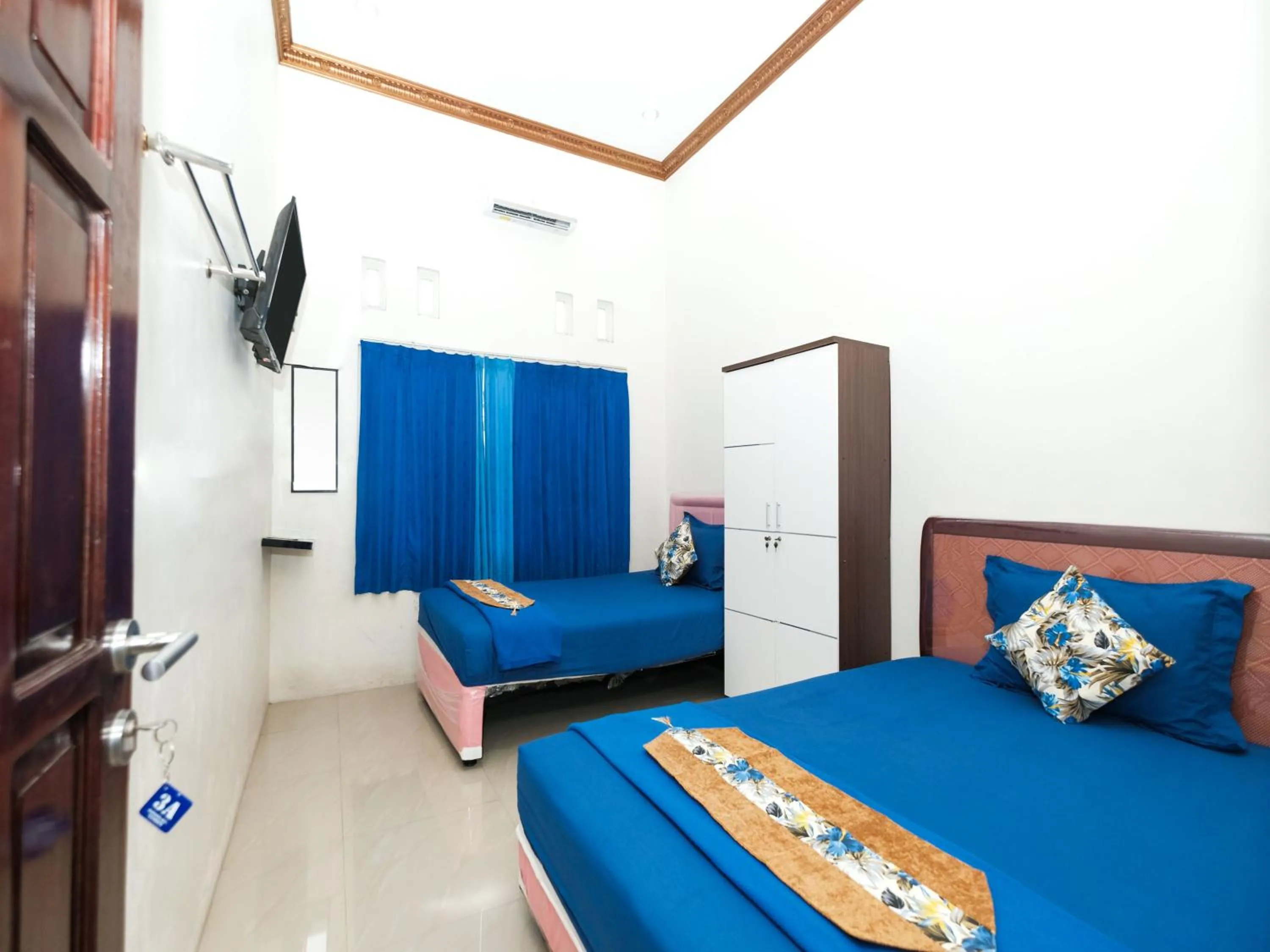 Photo of the whole room, Bed in Griya One Family
