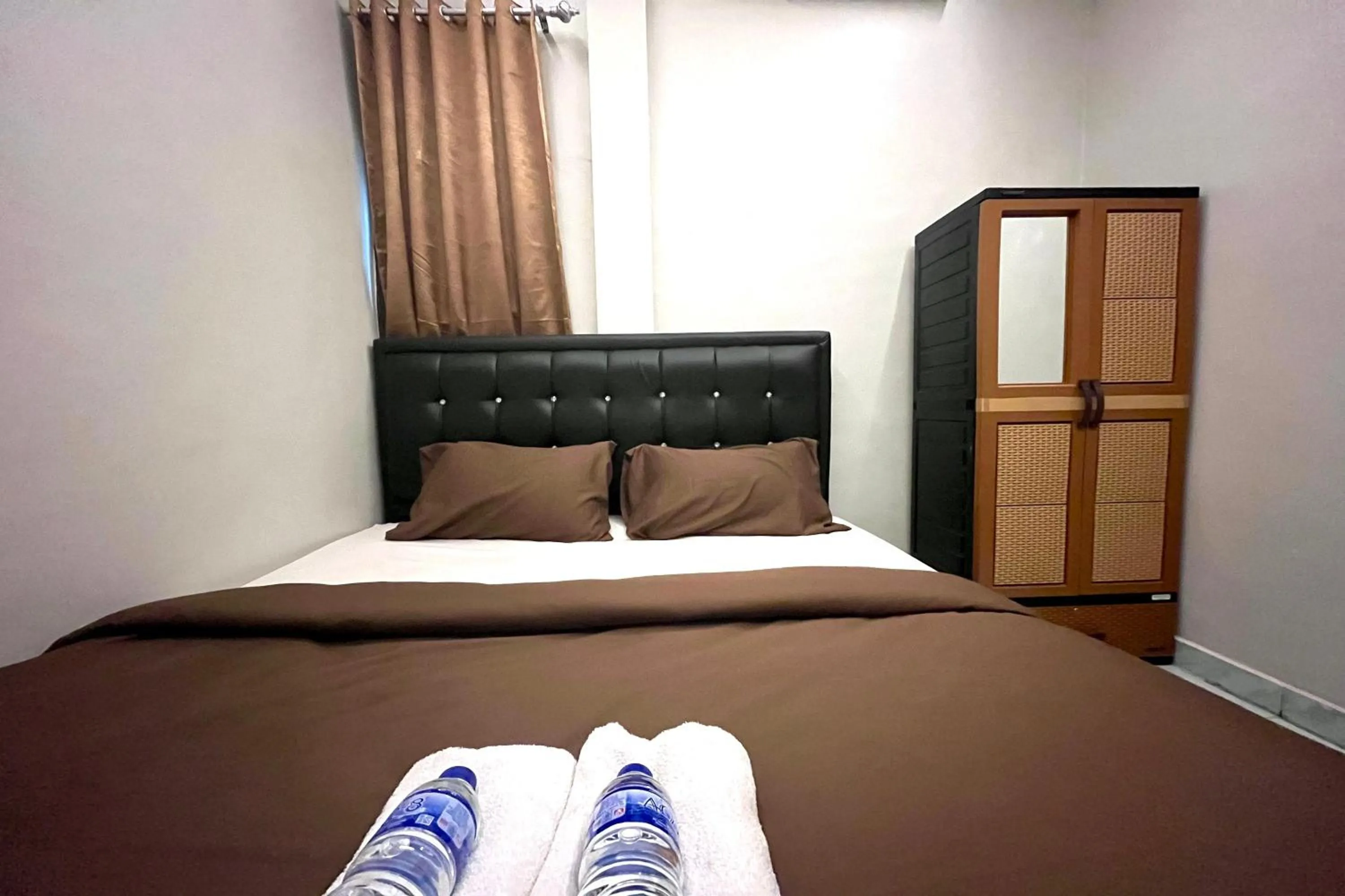 Bed in Gratia Guesthouse Syari'ah