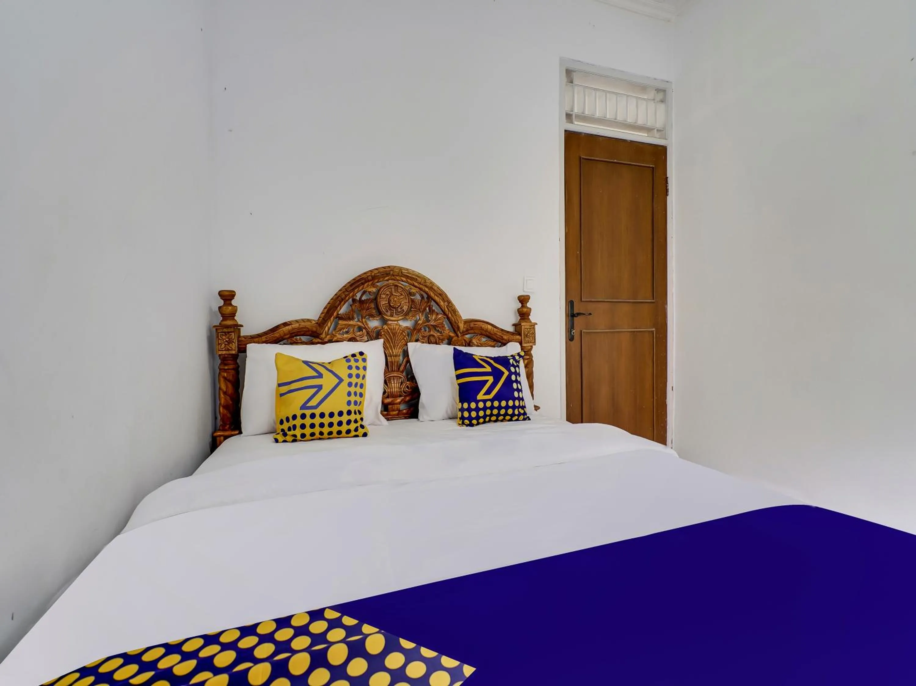 Bedroom in SPOT ON 91107 Villa Galaxy Resort