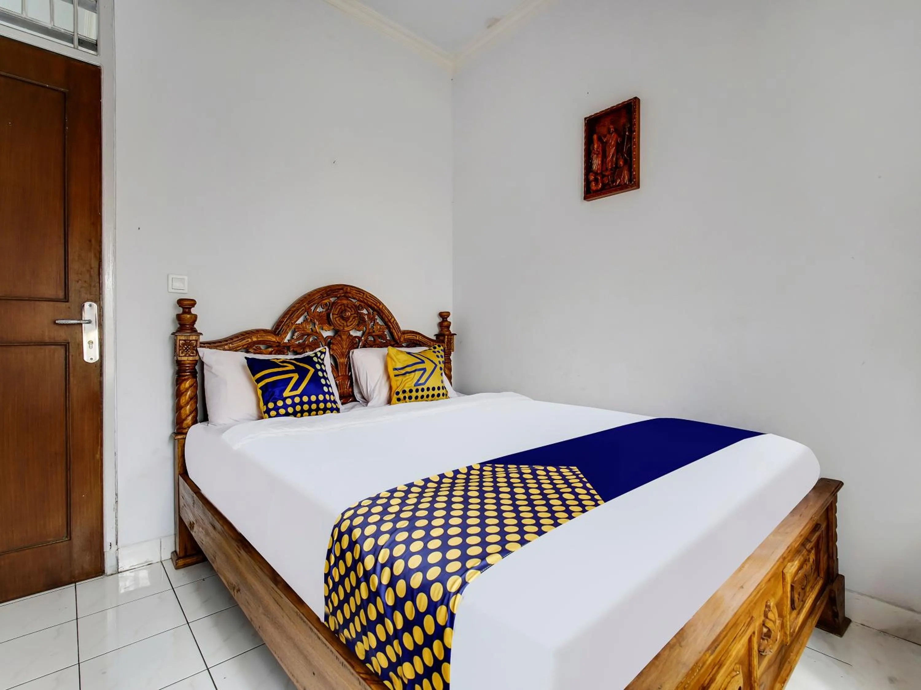 Bedroom in SPOT ON 91107 Villa Galaxy Resort