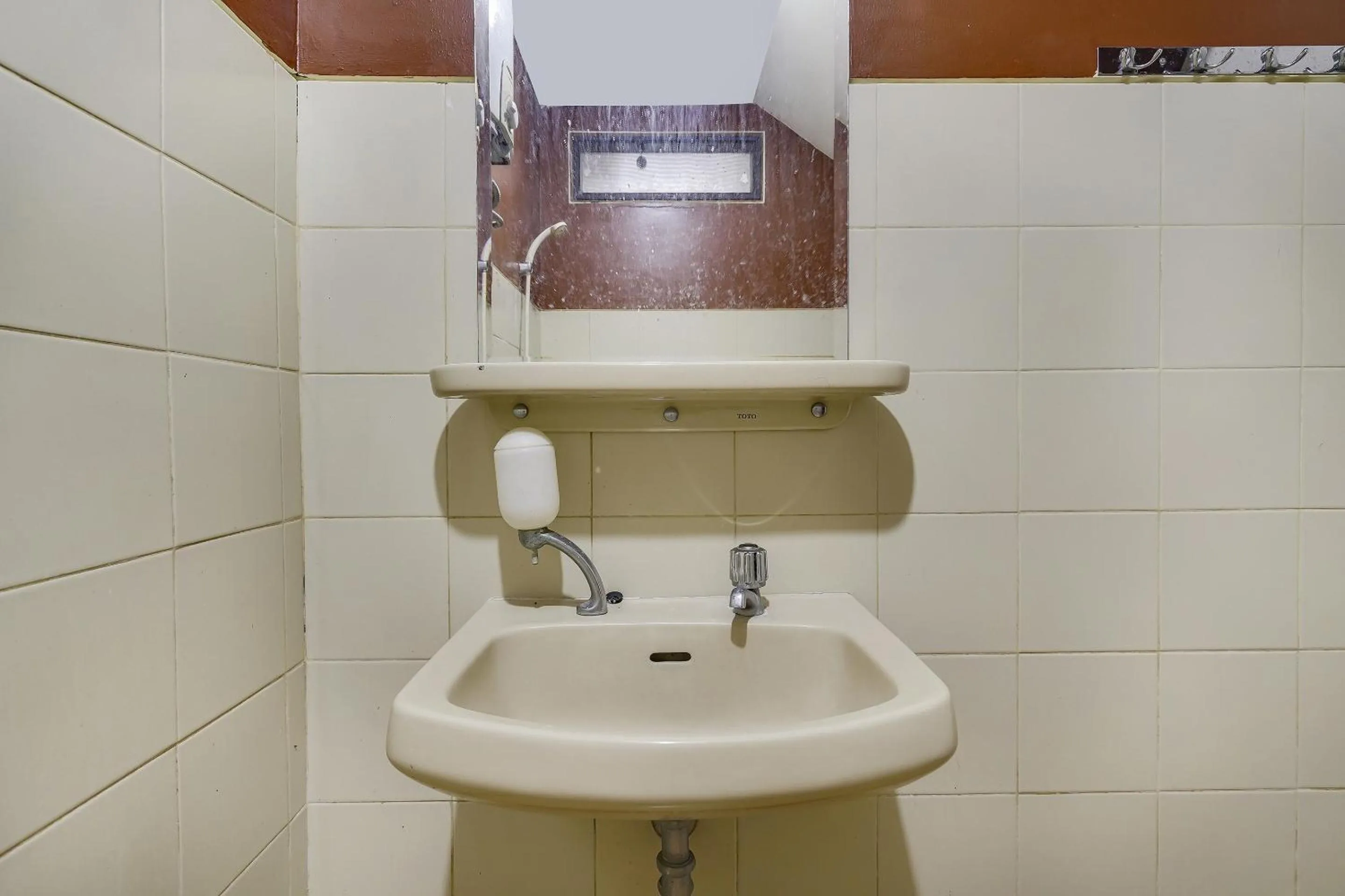 Bathroom in SPOT ON 91107 Villa Galaxy Resort