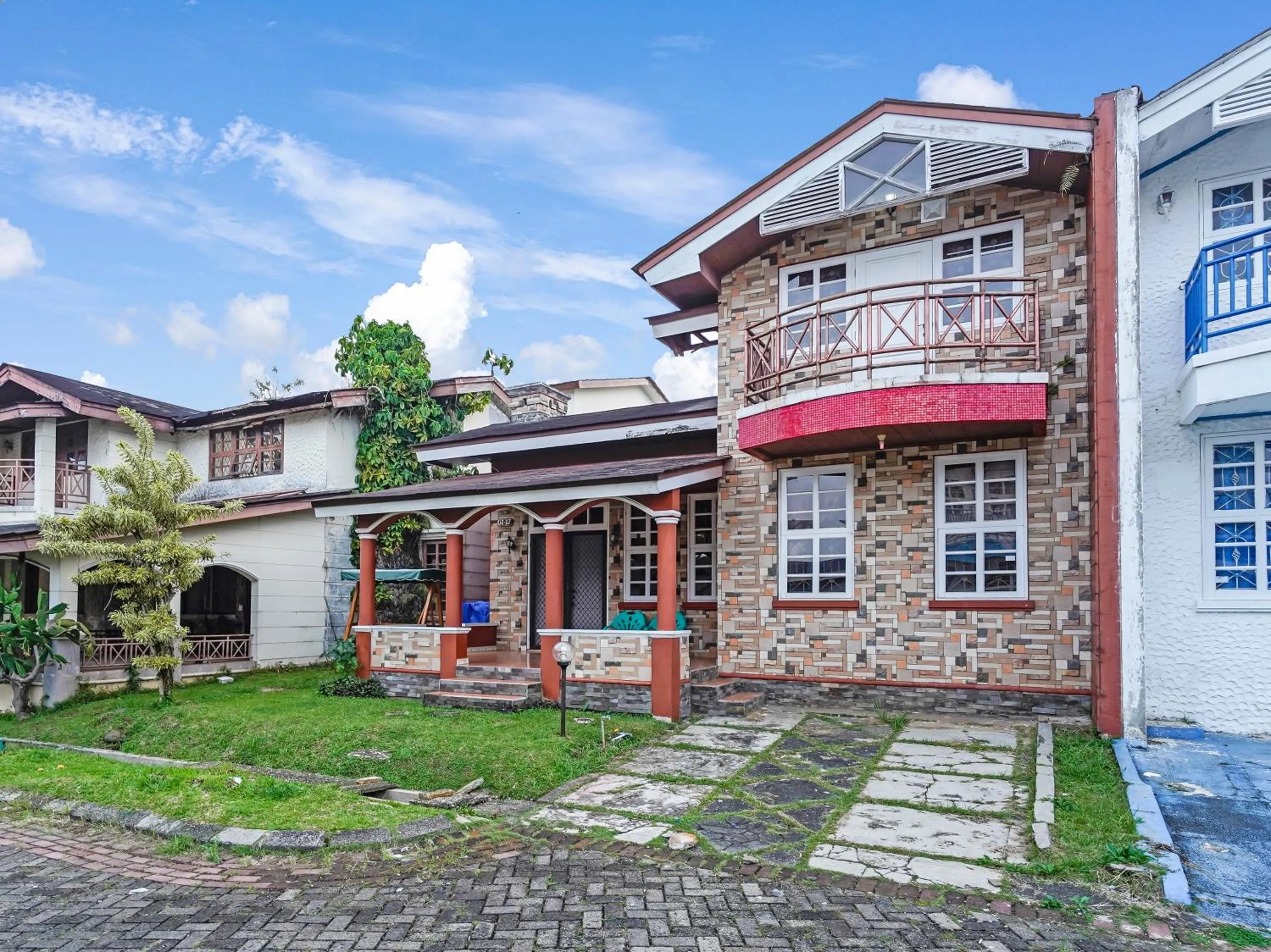 Property building in SPOT ON 91107 Villa Galaxy Resort