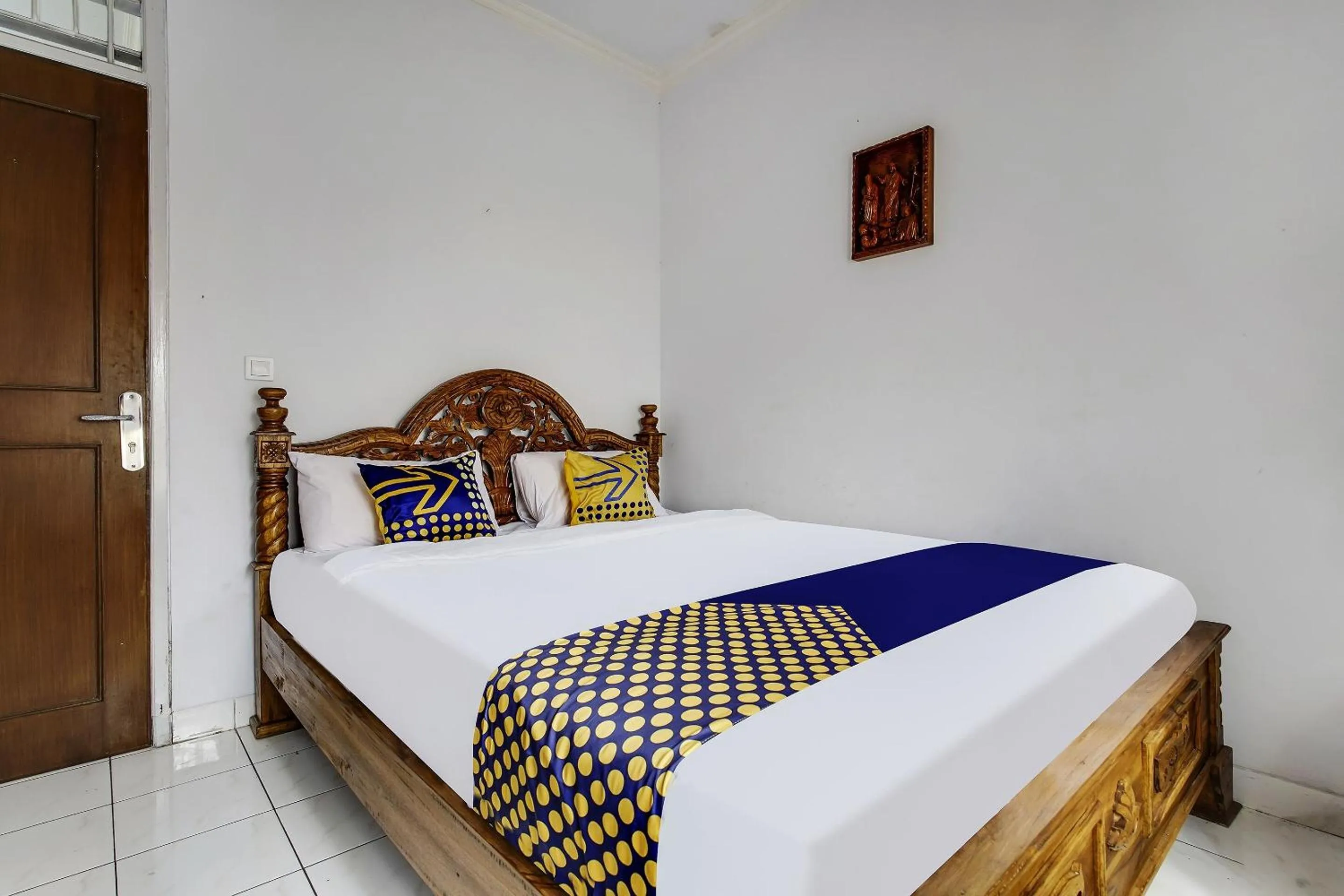 Bedroom in SPOT ON 91107 Villa Galaxy Resort