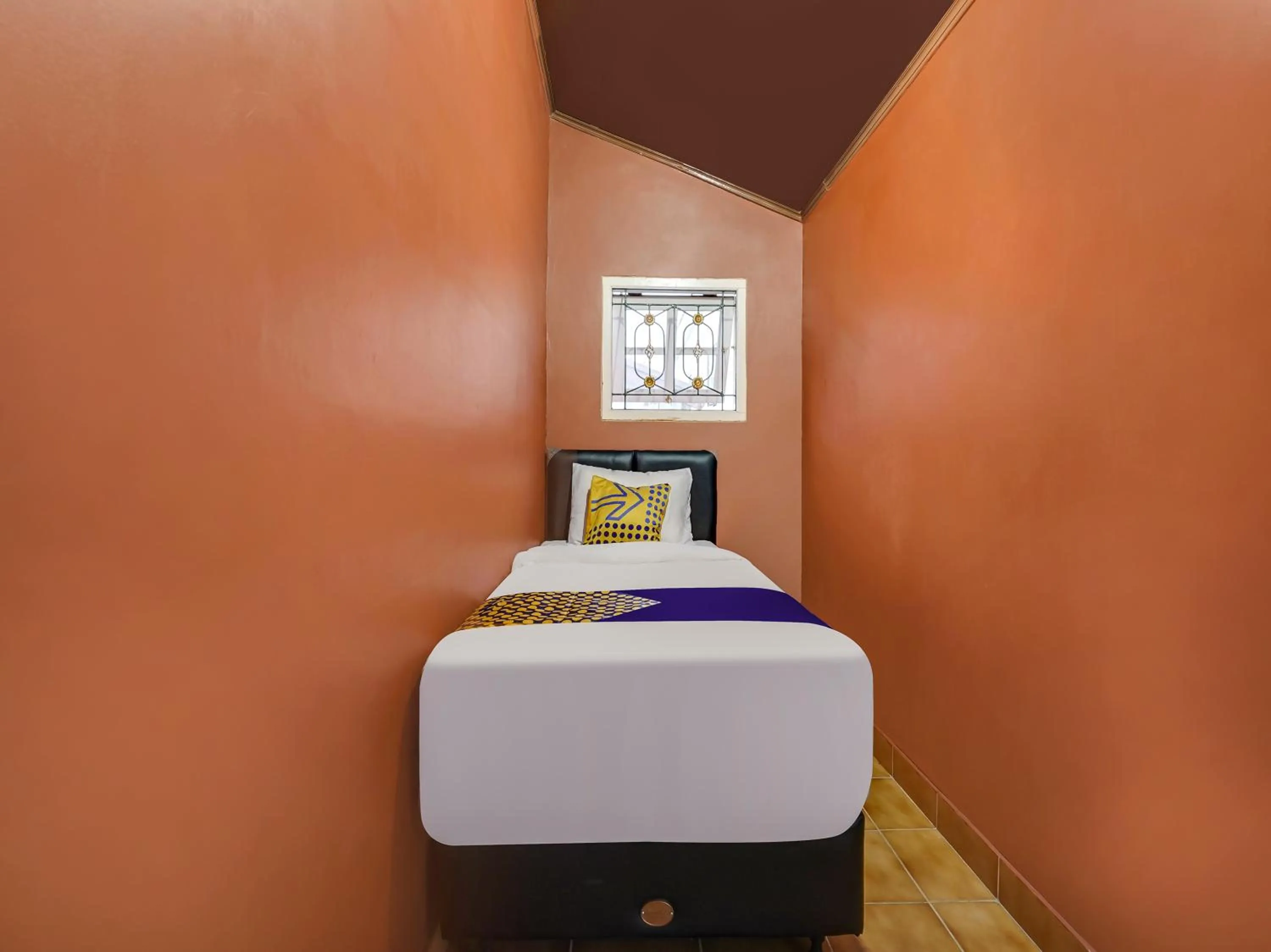 Bedroom in SPOT ON 91107 Villa Galaxy Resort