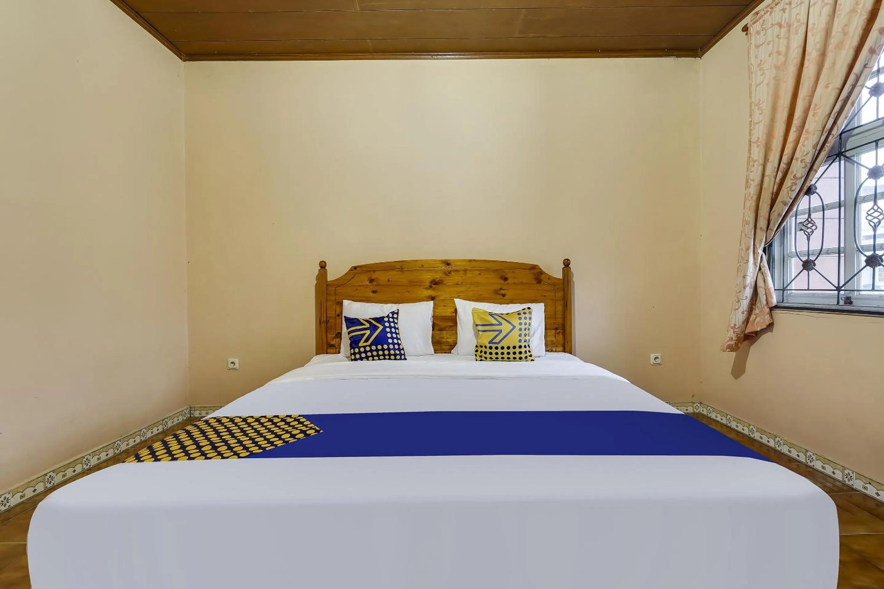 Bedroom in SPOT ON 91107 Villa Galaxy Resort