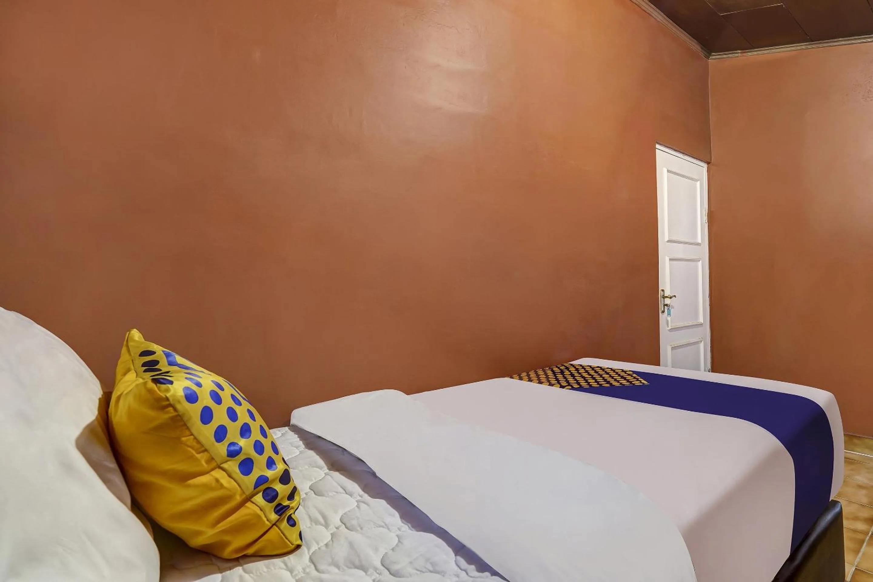 Bedroom in SPOT ON 91107 Villa Galaxy Resort