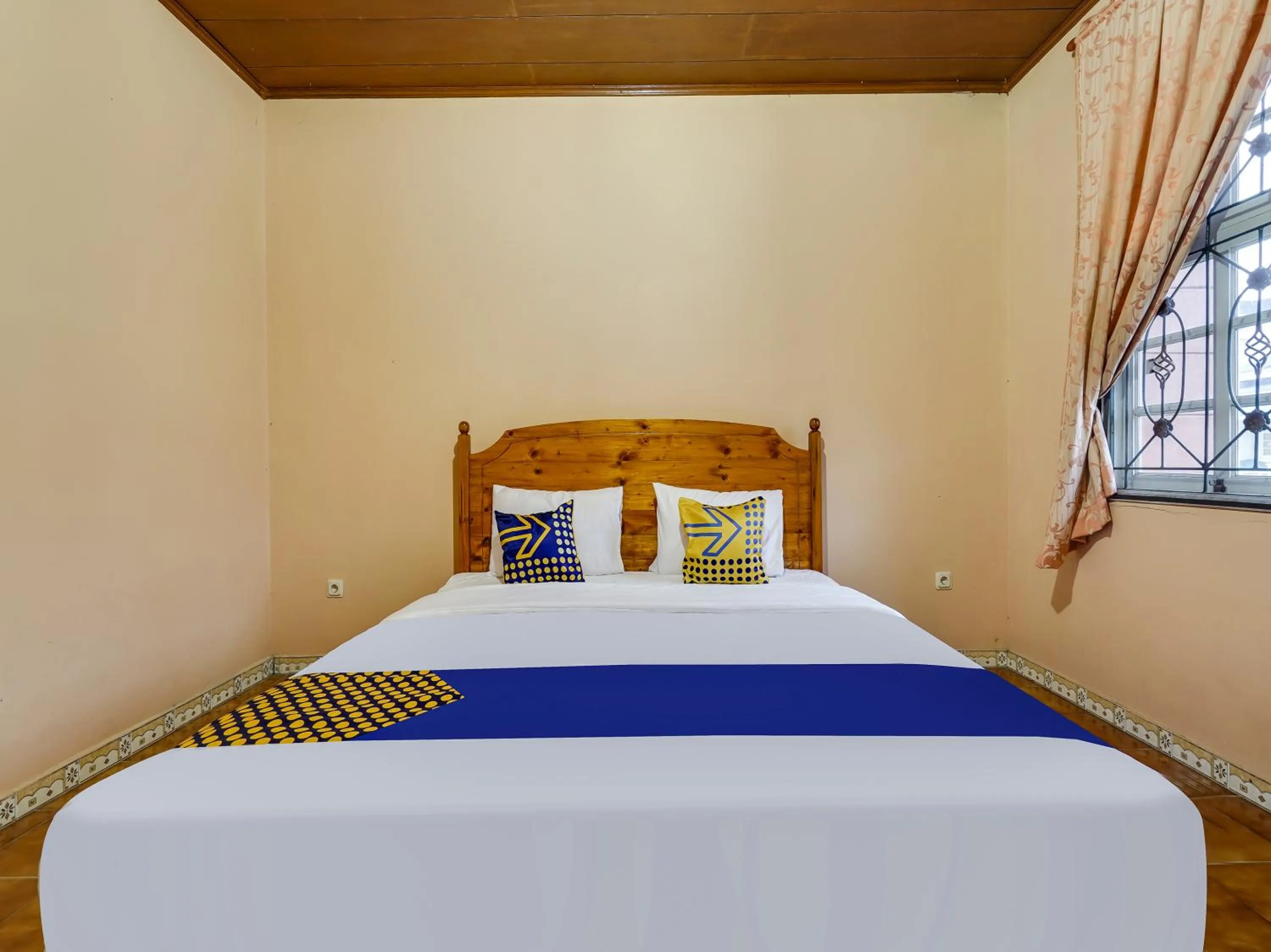 Bedroom in SPOT ON 91107 Villa Galaxy Resort