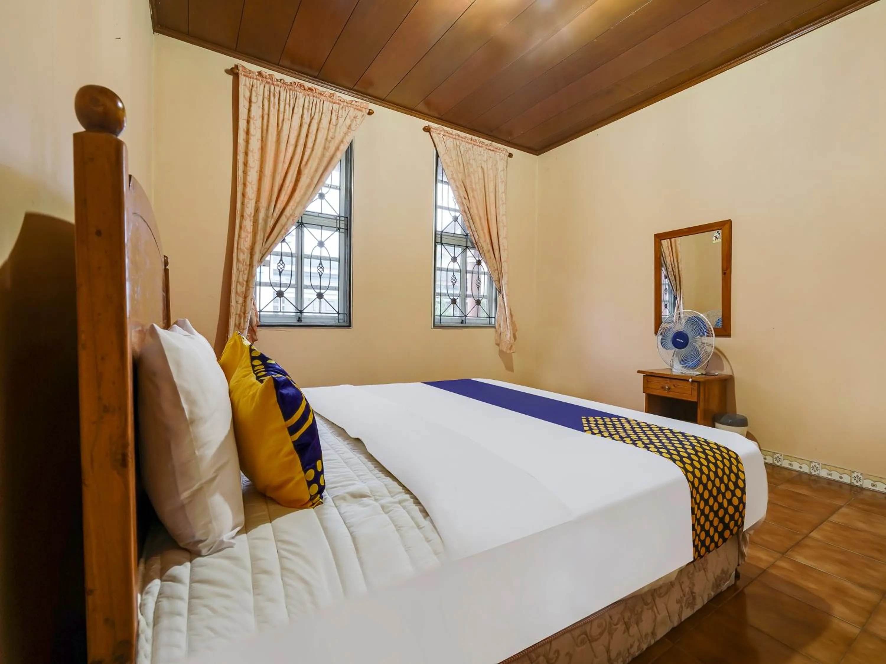 Bedroom in SPOT ON 91107 Villa Galaxy Resort