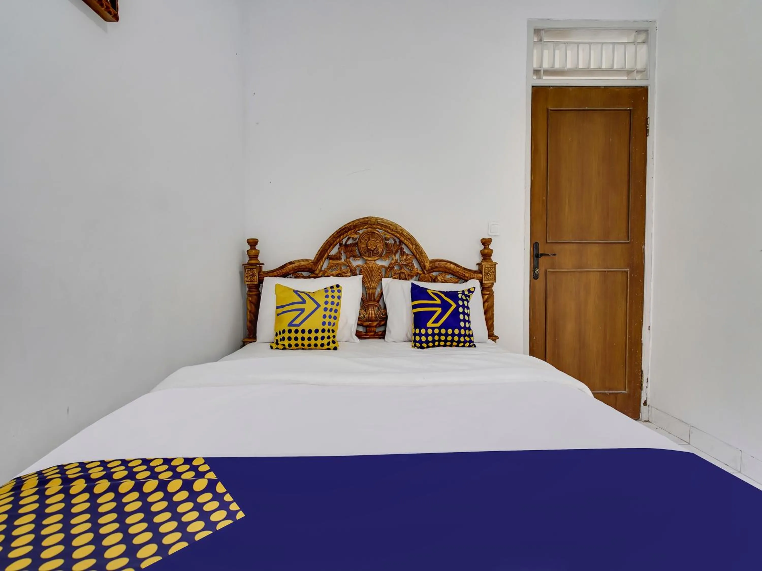 Bedroom in SPOT ON 91107 Villa Galaxy Resort