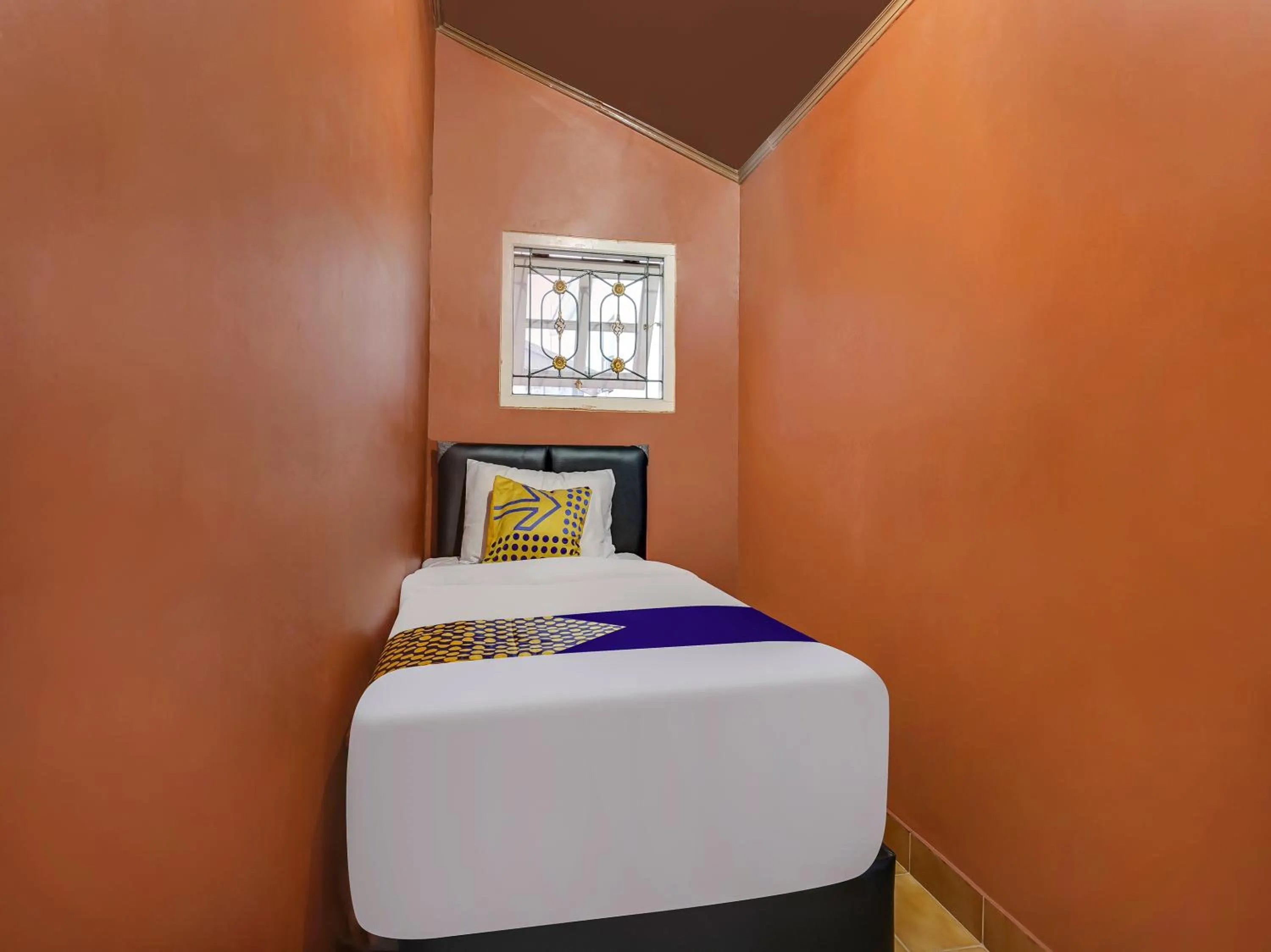 Bedroom in SPOT ON 91107 Villa Galaxy Resort