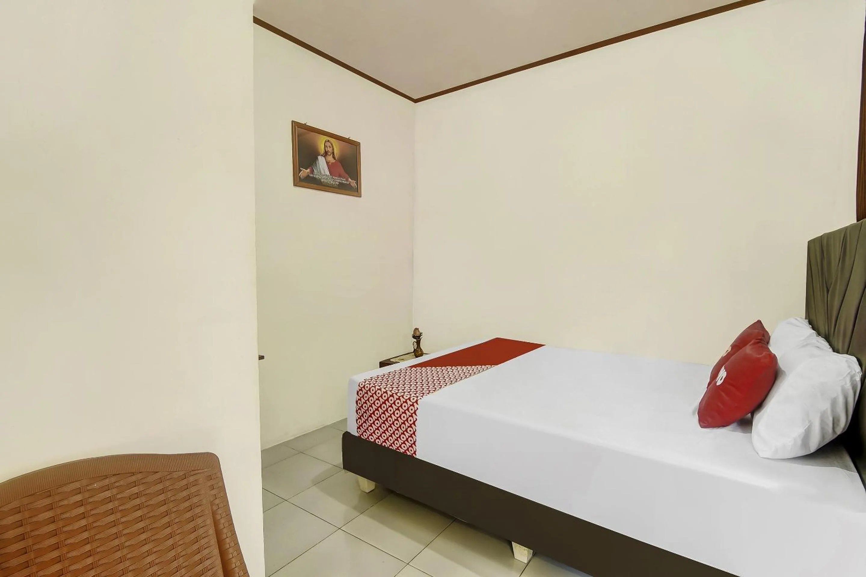 Bedroom in Hotel O Desa Wisata Marinsow Near Gereja Pantekosta Marinsow
