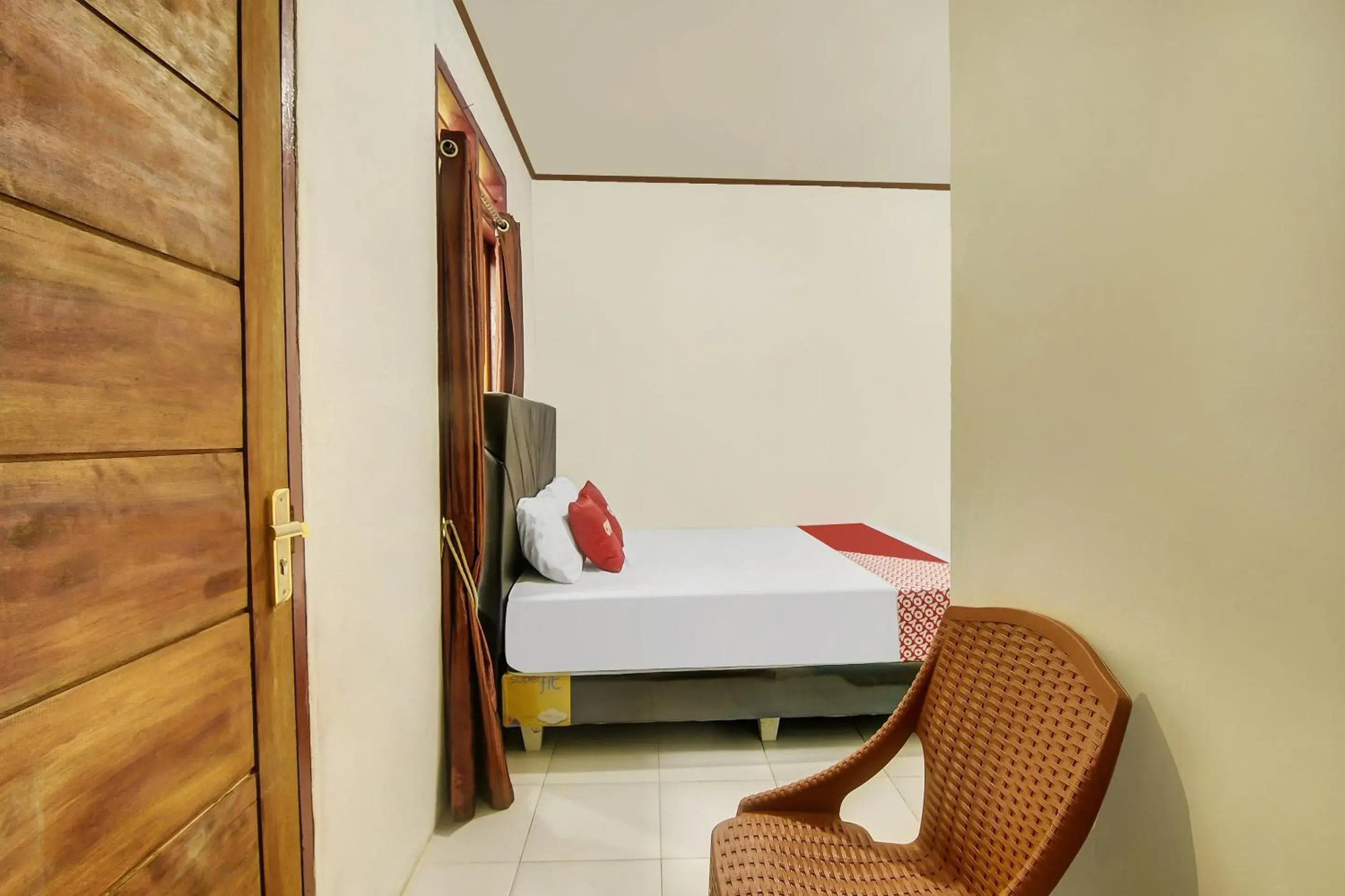 Bedroom in Hotel O Desa Wisata Marinsow Near Gereja Pantekosta Marinsow Bedroom in Hotel O Desa Wisata Marinsow Near Gereja Pantekosta Marinsow