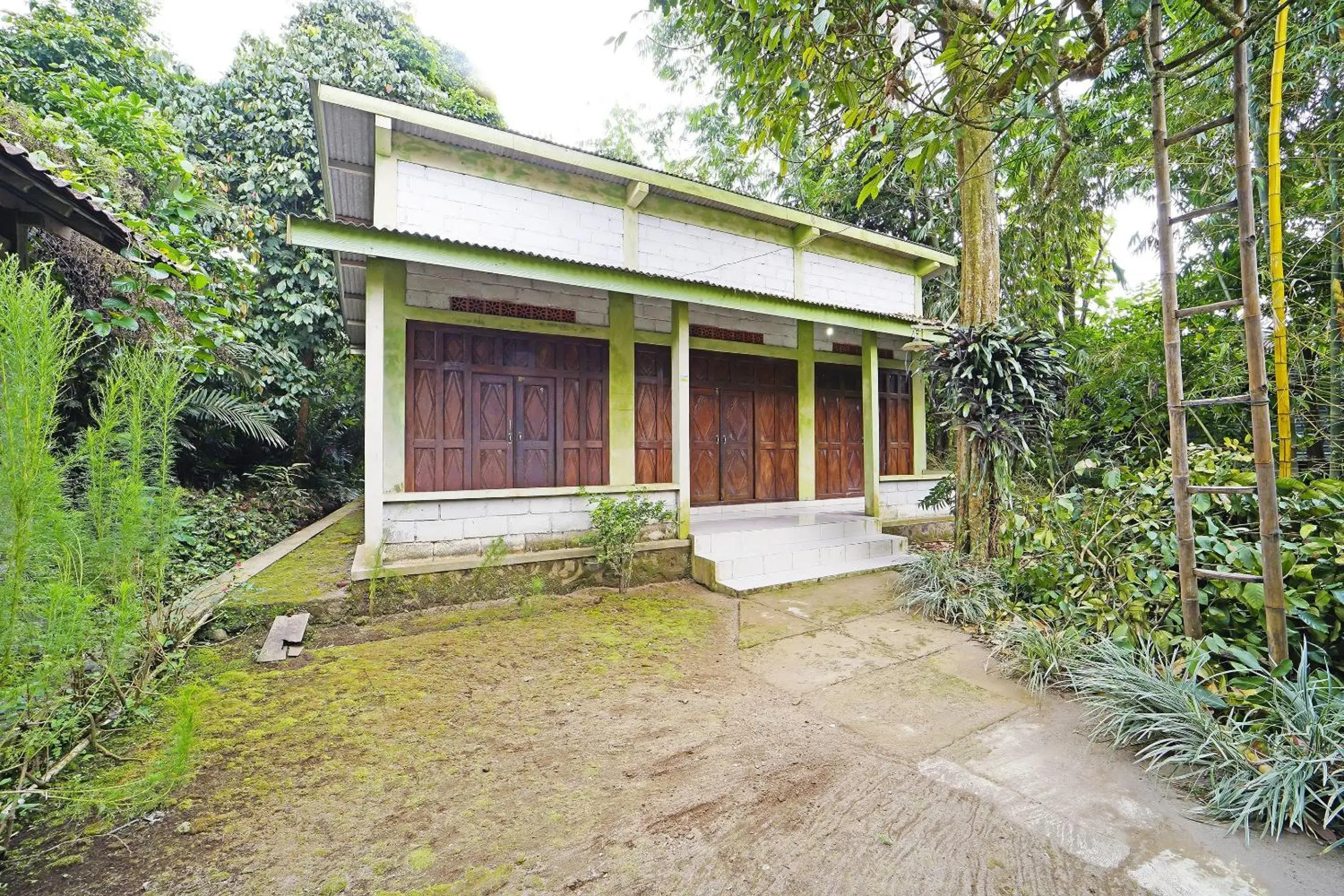 Bedroom in Hotel O Griya Estu Wening Bedroom in Hotel O Griya Estu Wening
