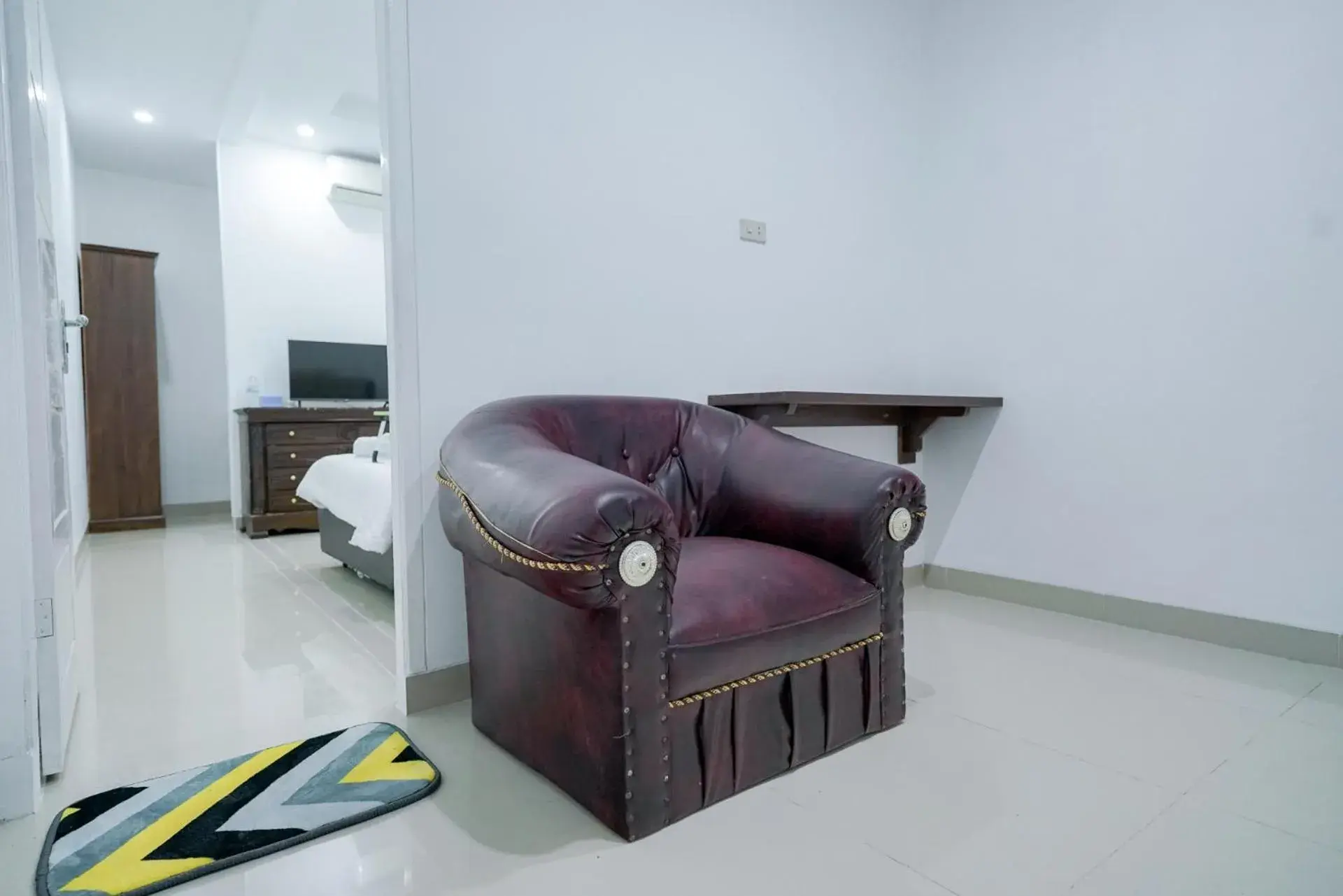 Seating area in Urbanview Hotel Pondok Indah Pringsewu By RedDoorz Seating area in Urbanview Hotel Pondok Indah Pringsewu By RedDoorz