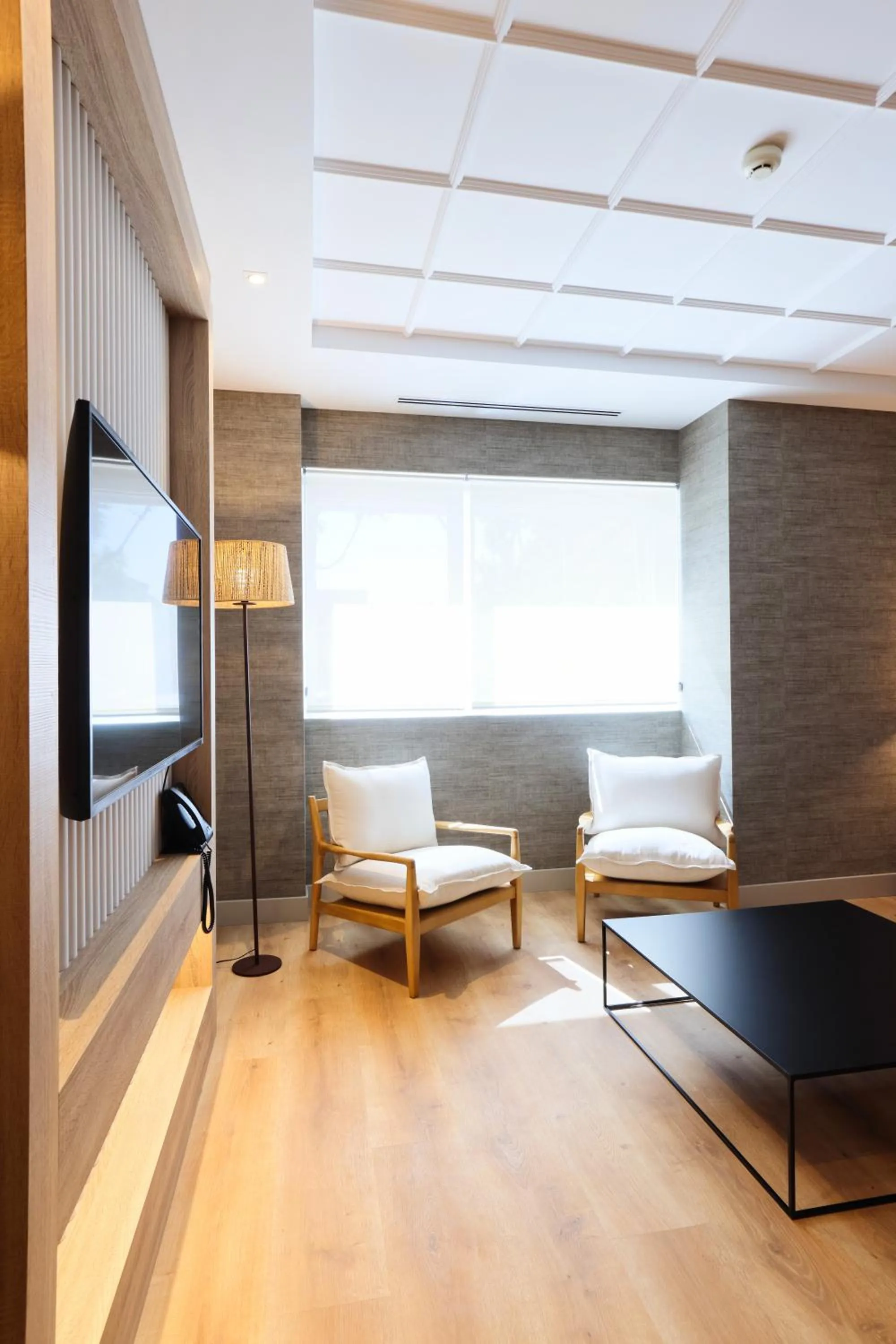 Living room in THE APARTMENT by assethoteles