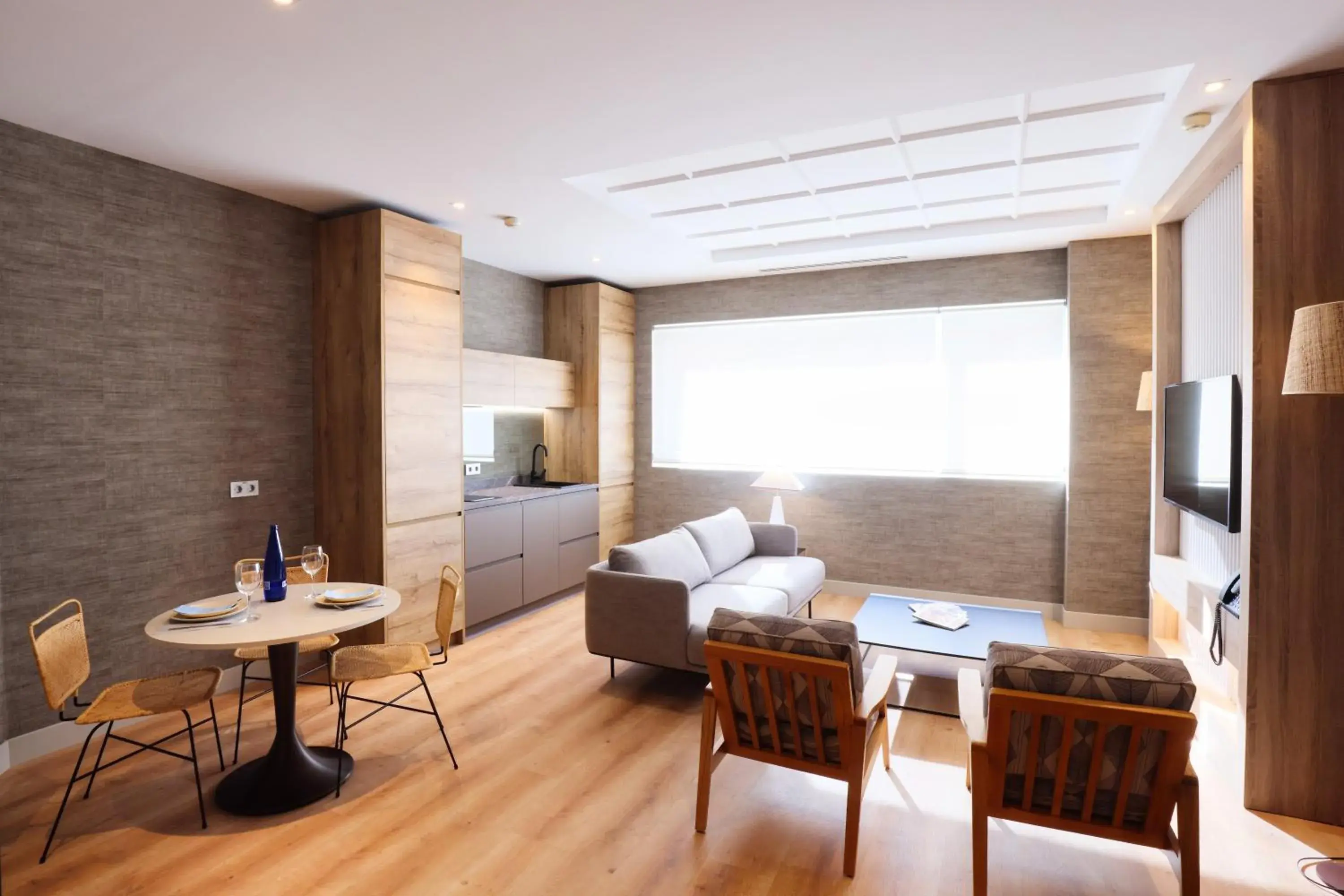 Living room, Bed in THE APARTMENT by assethoteles Living room, Bed in THE APARTMENT by assethoteles