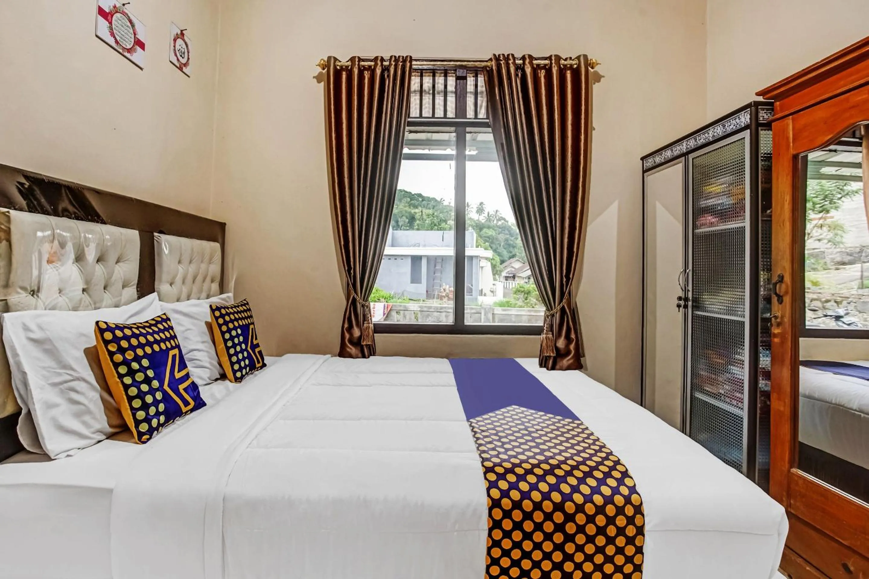 Bedroom in Hotel O Desa Wisata Sumber Agung Syariah
