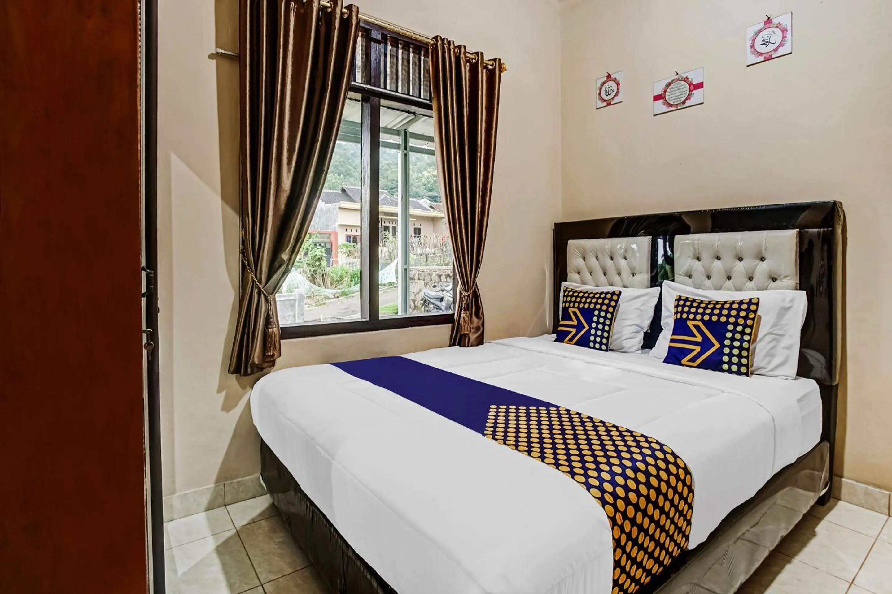 Bedroom in Hotel O Desa Wisata Sumber Agung Syariah