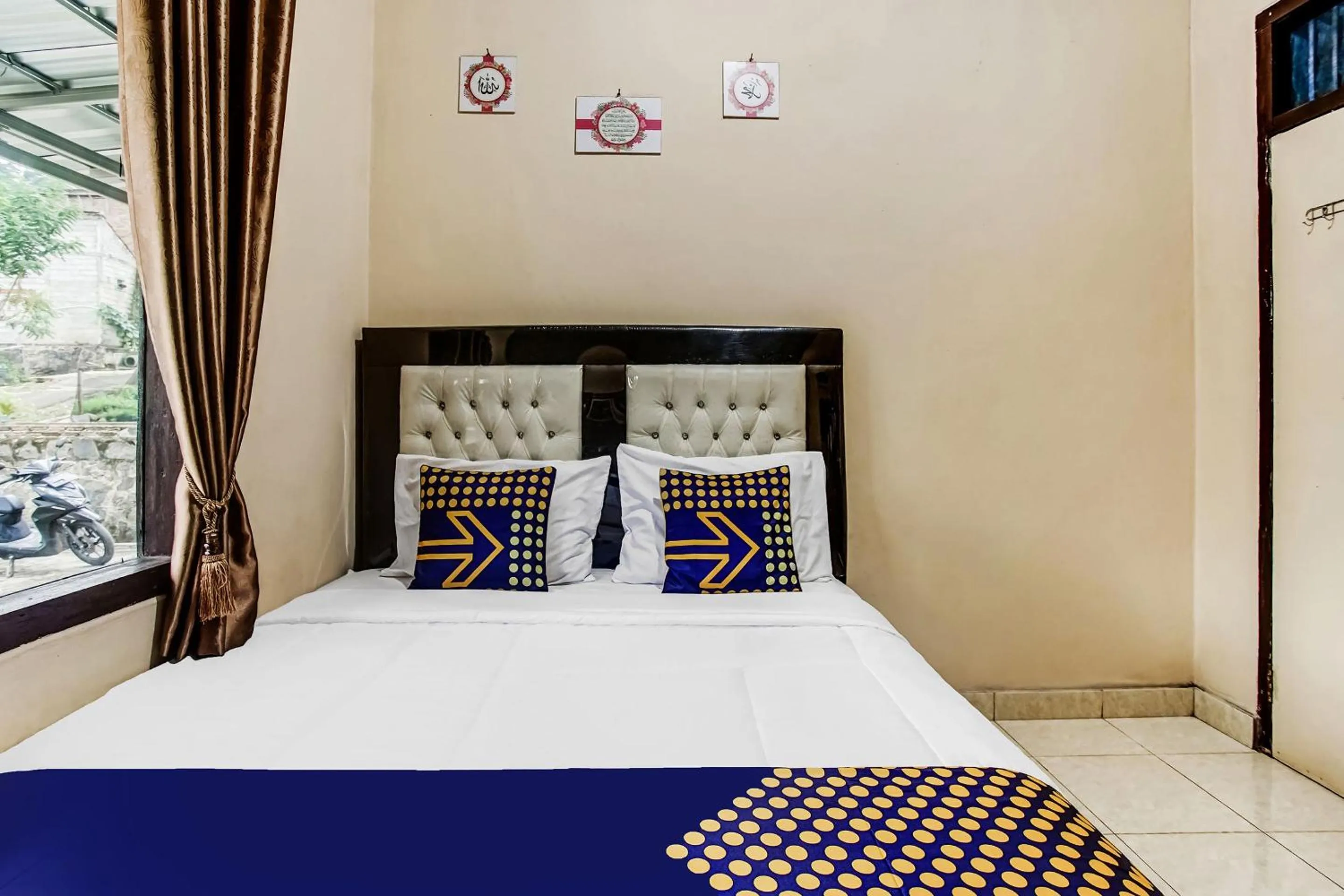 Bedroom in Hotel O Desa Wisata Sumber Agung Syariah