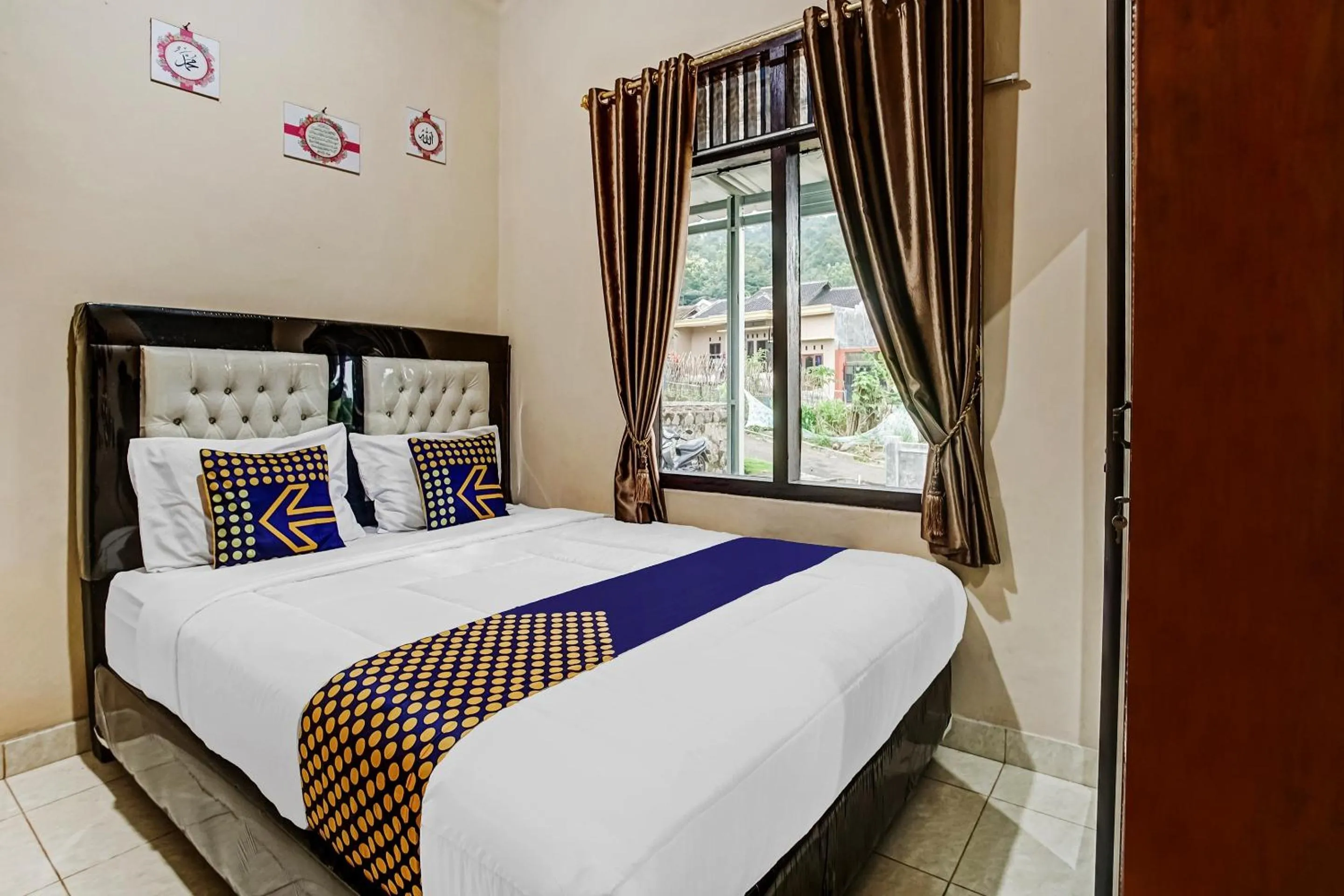 Bedroom in Hotel O Desa Wisata Sumber Agung Syariah