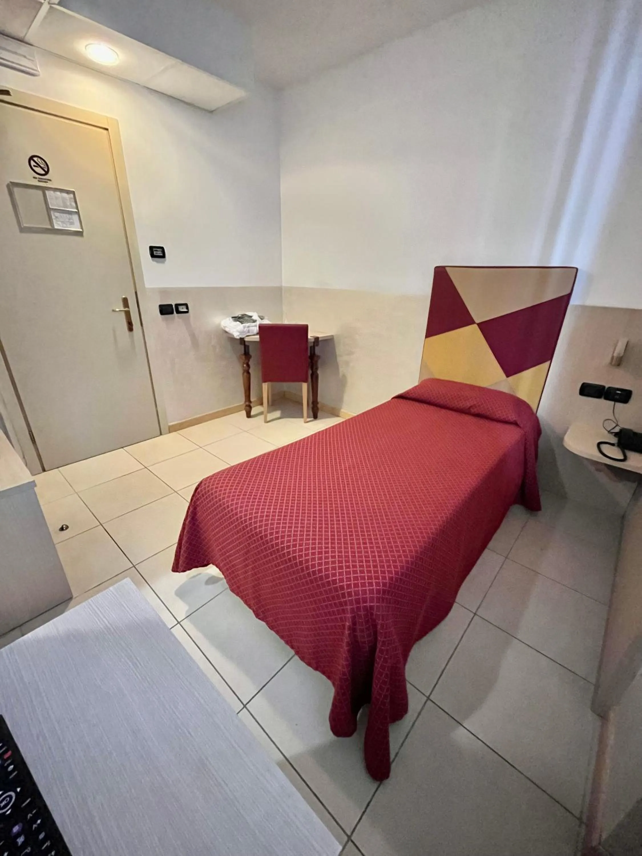 Bed in Hotel Lovere Resort & Spa