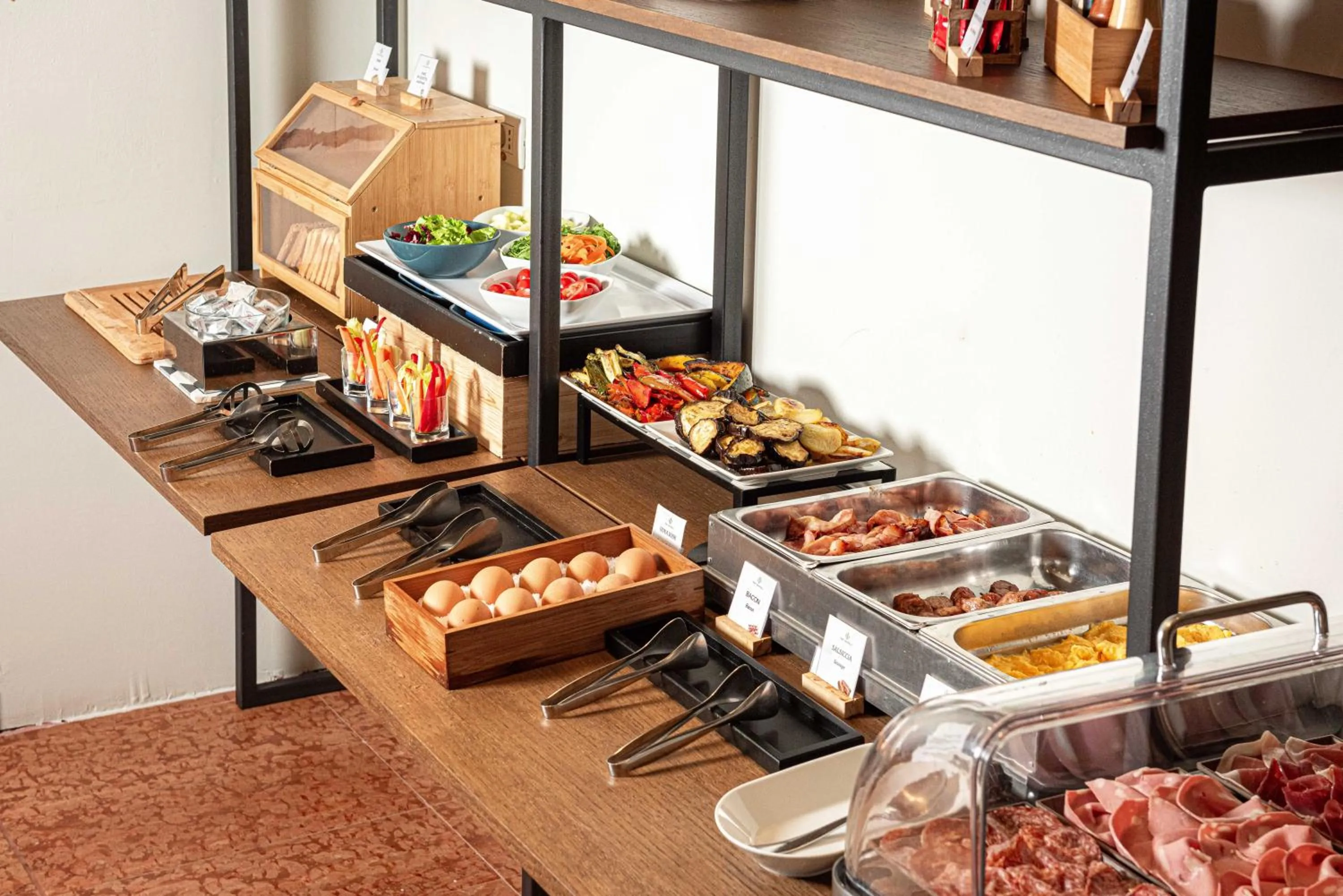 Buffet breakfast in Phi Hotel Bologna Apartments