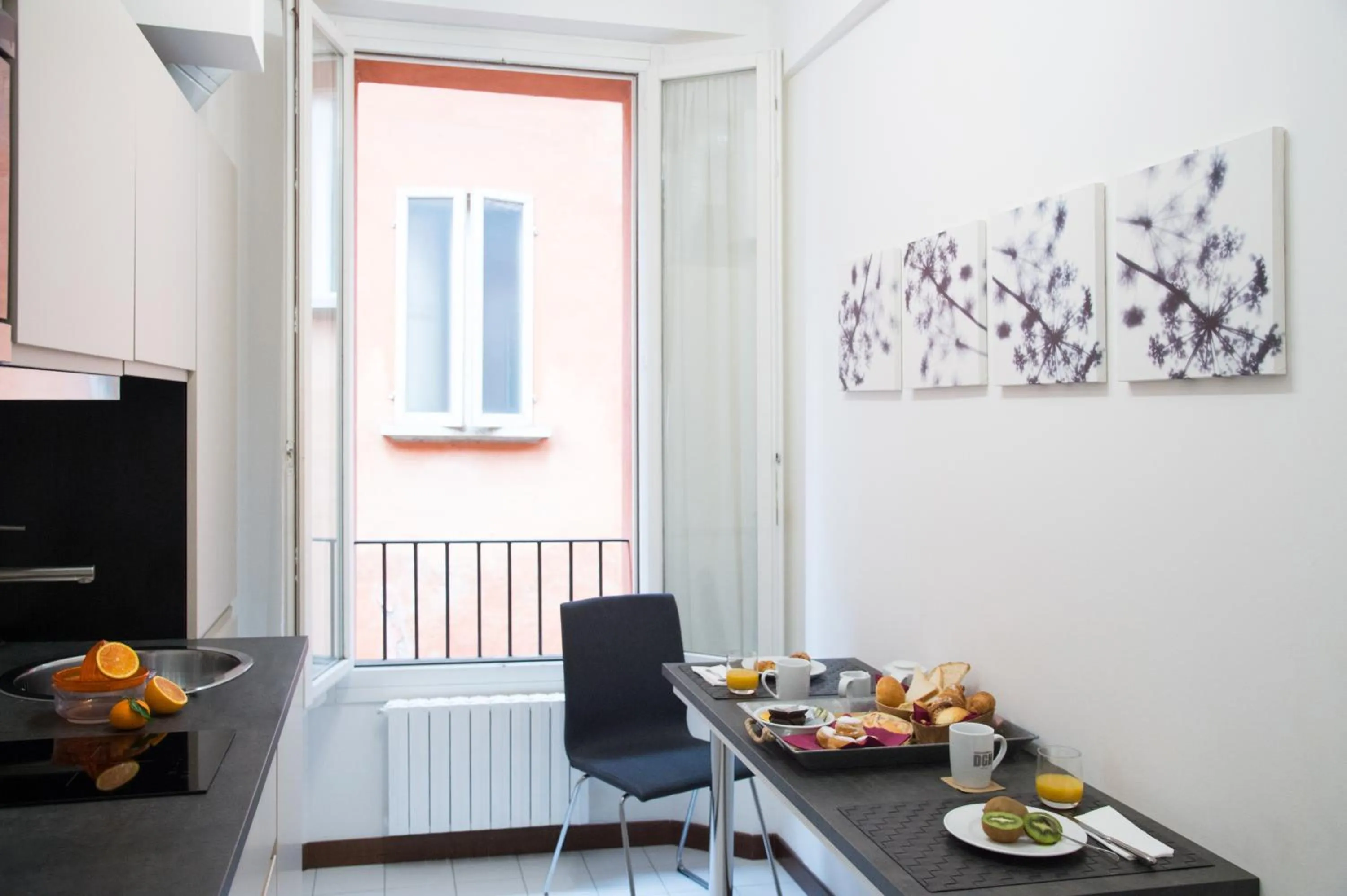 Kitchen or kitchenette in Phi Hotel Bologna Apartments