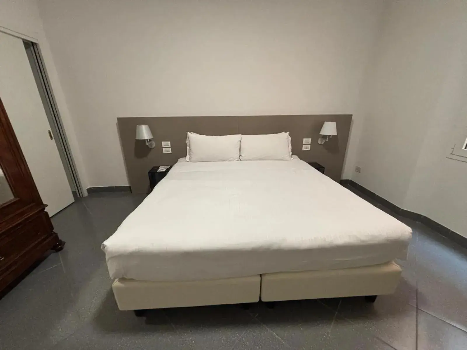 Bed in Phi Hotel Bologna Apartments Bed in Phi Hotel Bologna Apartments