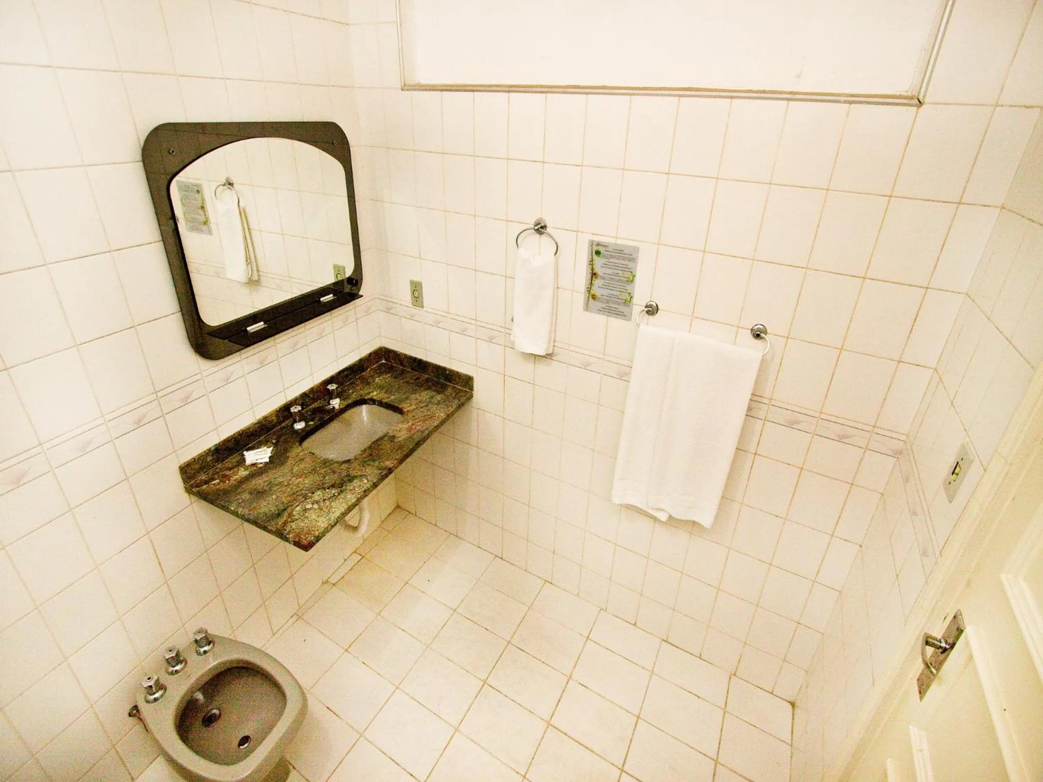 Toilet in Turrance White Hotel