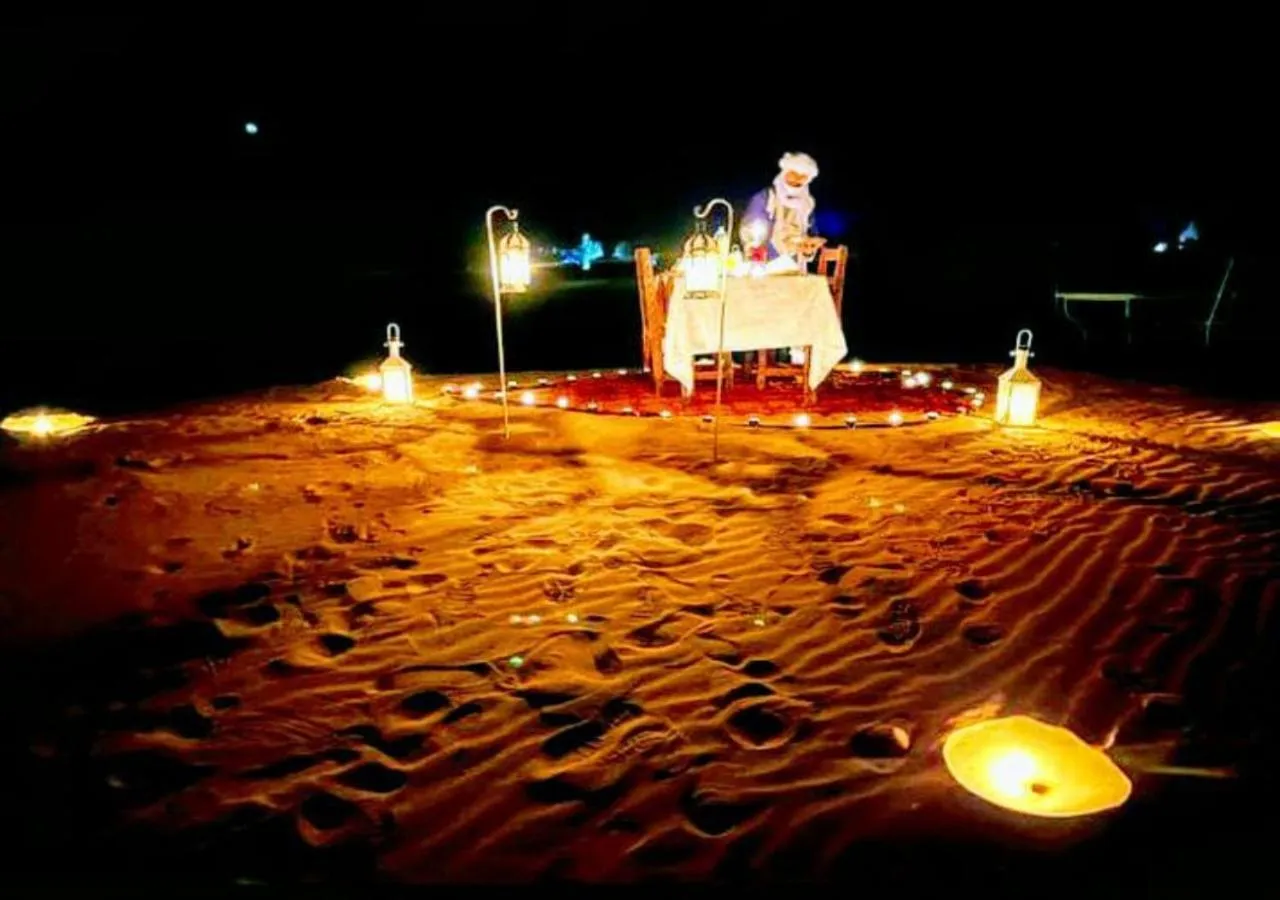 Evening entertainment in Merzouga experience camping