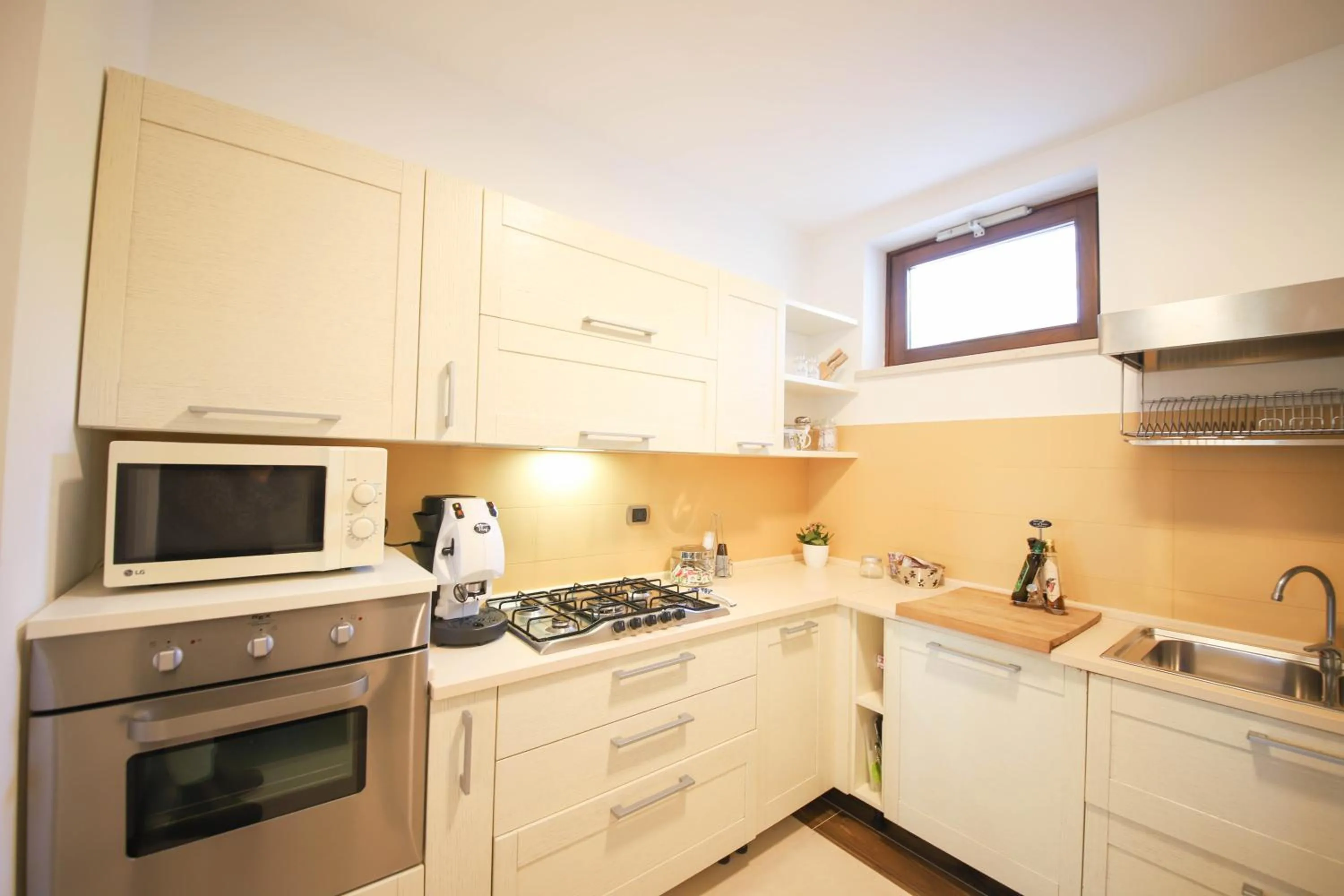 Kitchen or kitchenette in VILLA LAURETO by Apulia Hospitality
