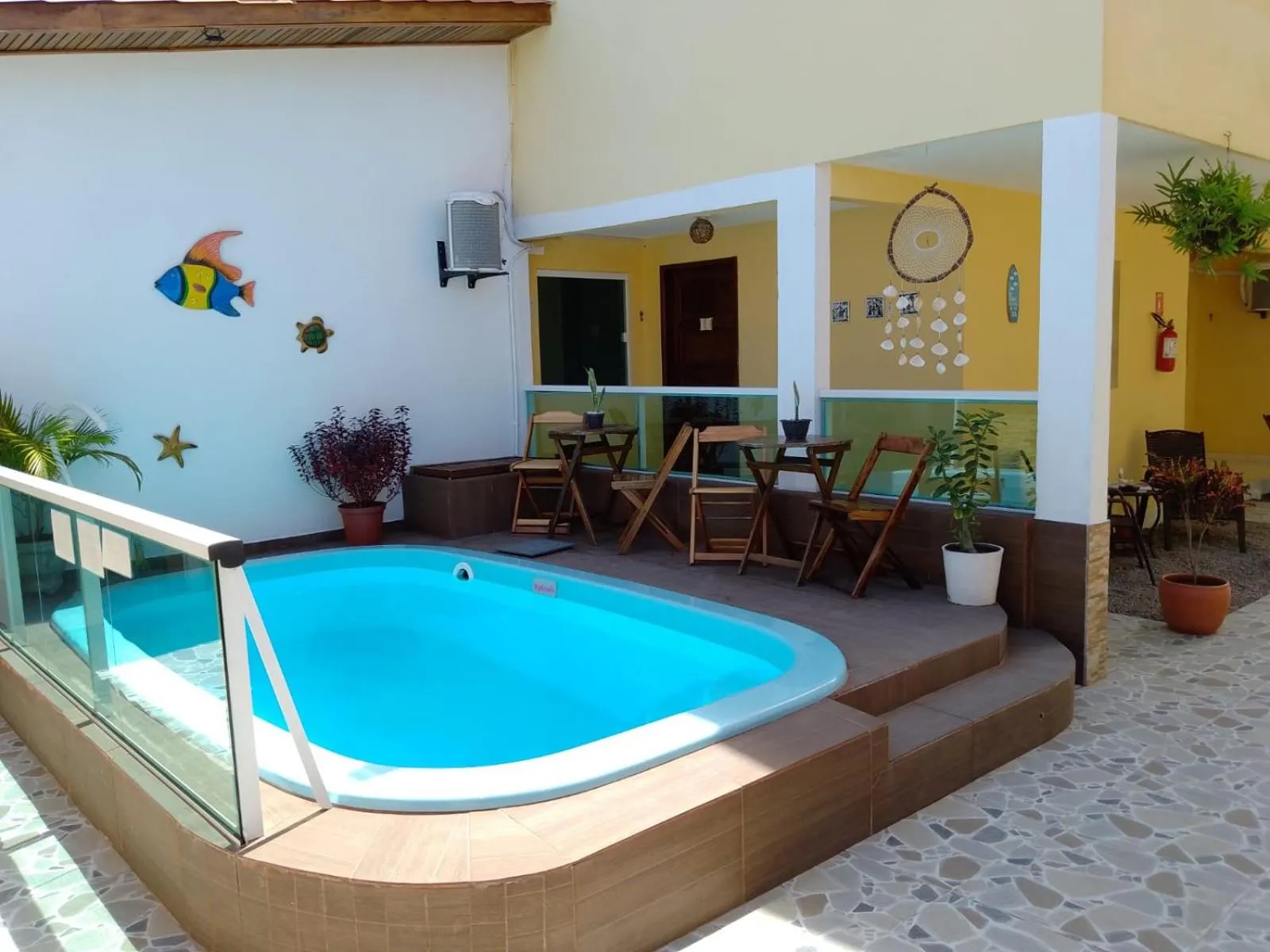 Swimming pool in Pousada Aconchego do Maraca