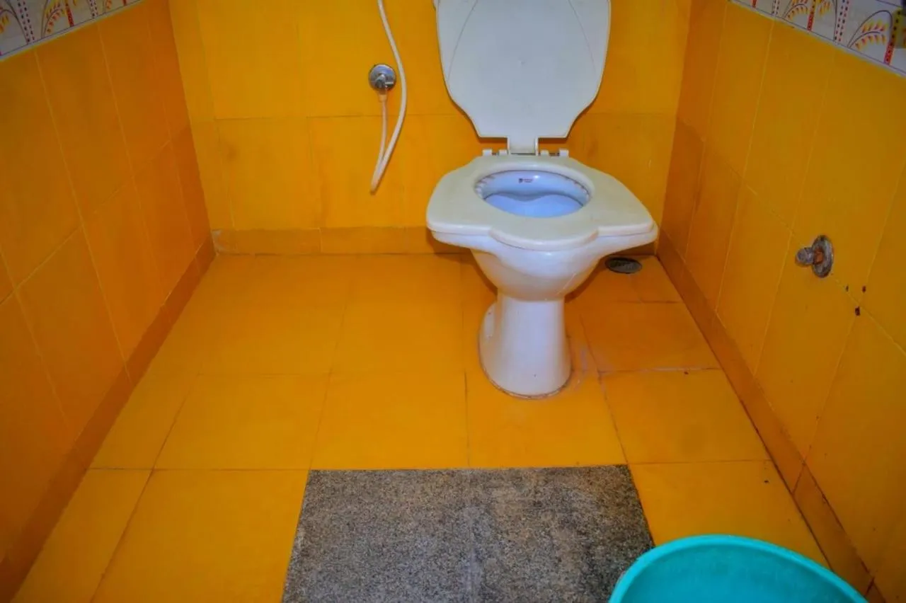 Toilet in Nature Inn Cottages