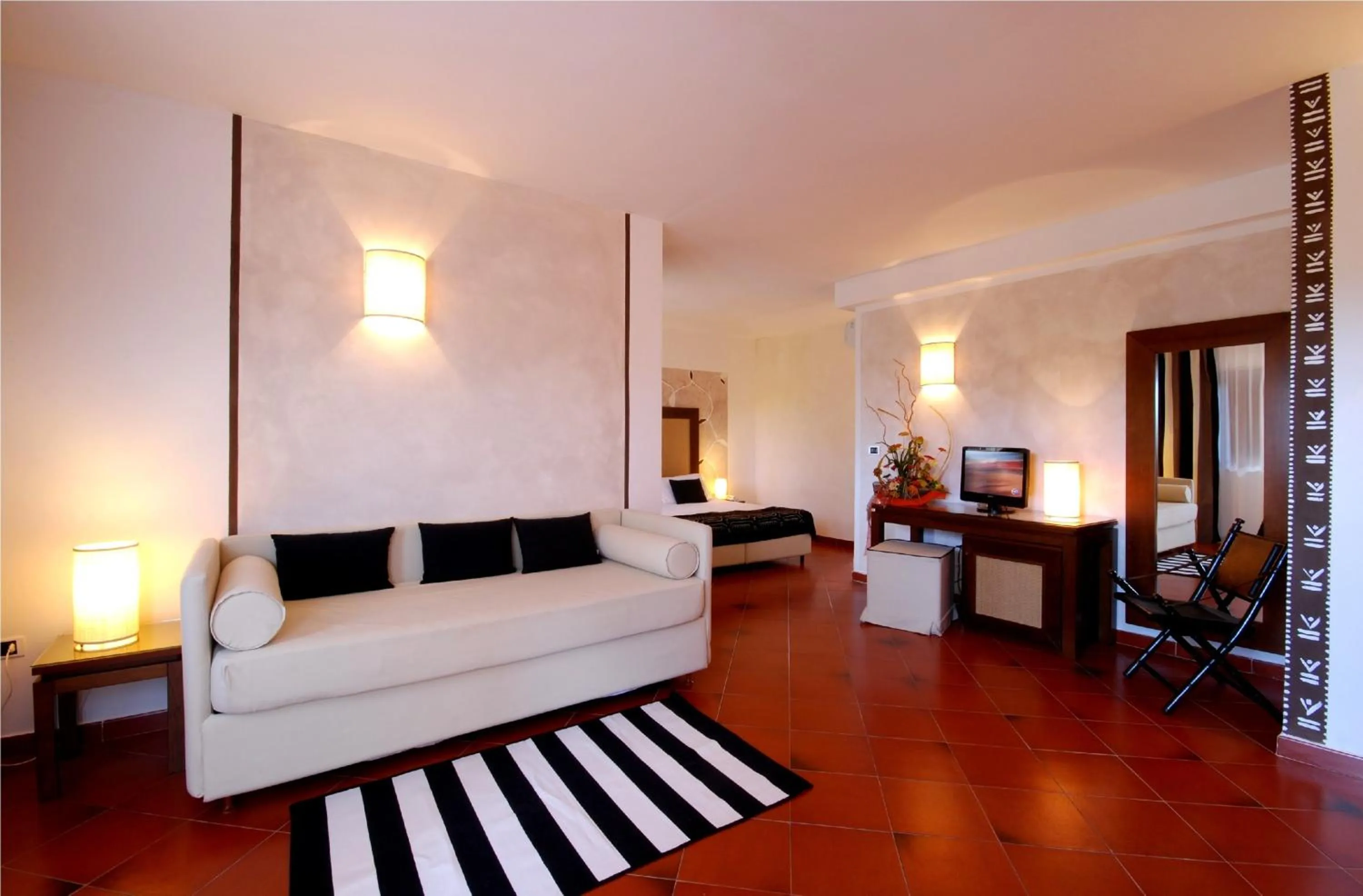 Living room, Bed in Cala Rosa Club Hotel