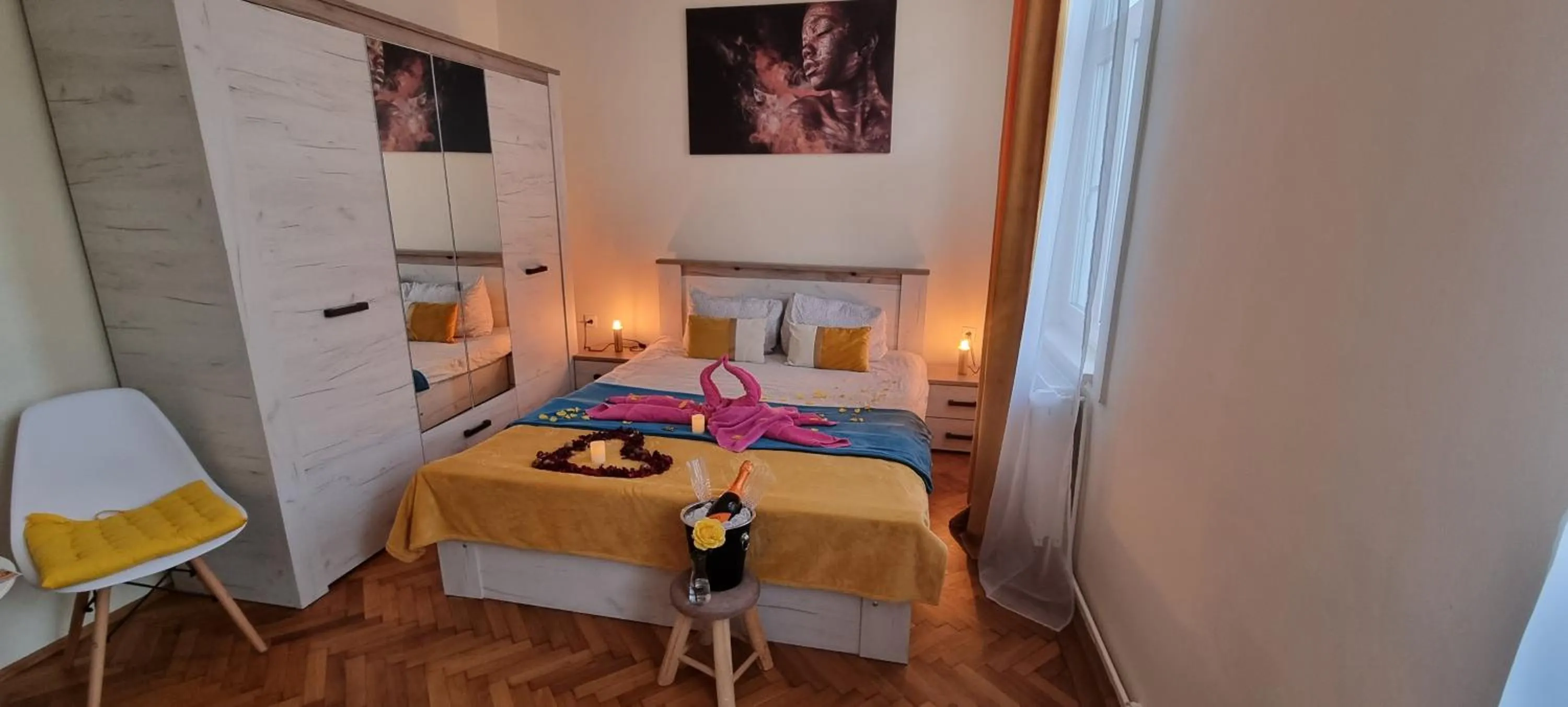Bed in Happy Mood Apartments