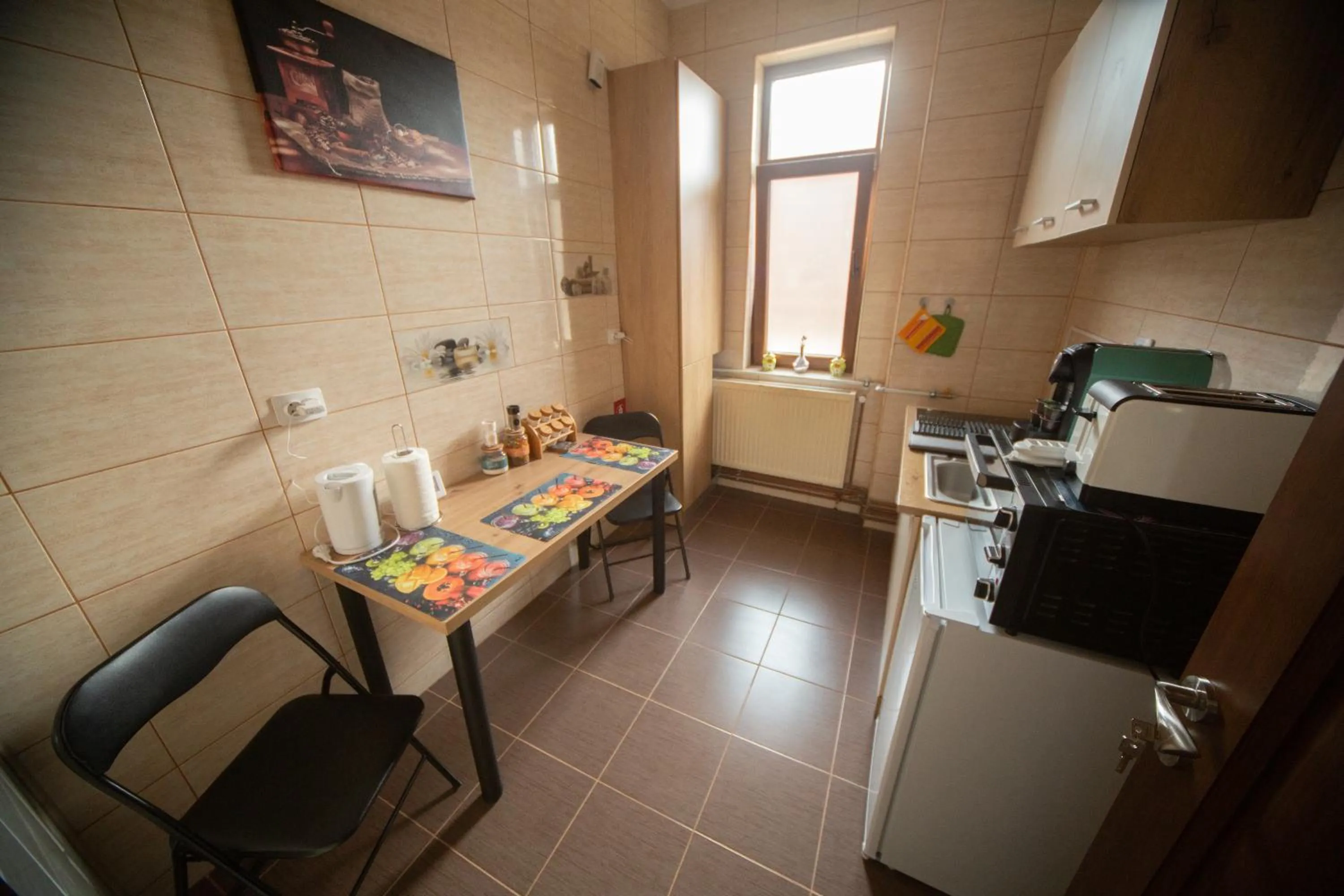 kitchen in Happy Mood Apartments