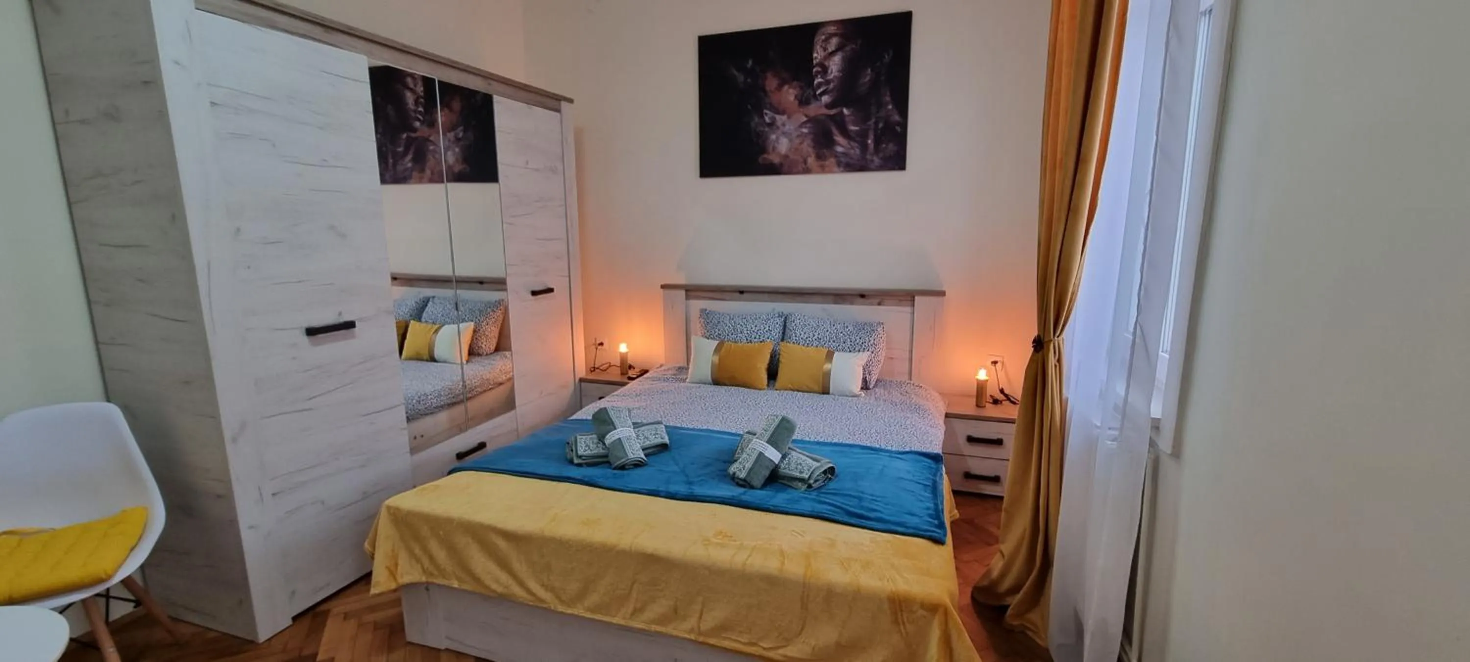 Bed in Happy Mood Apartments