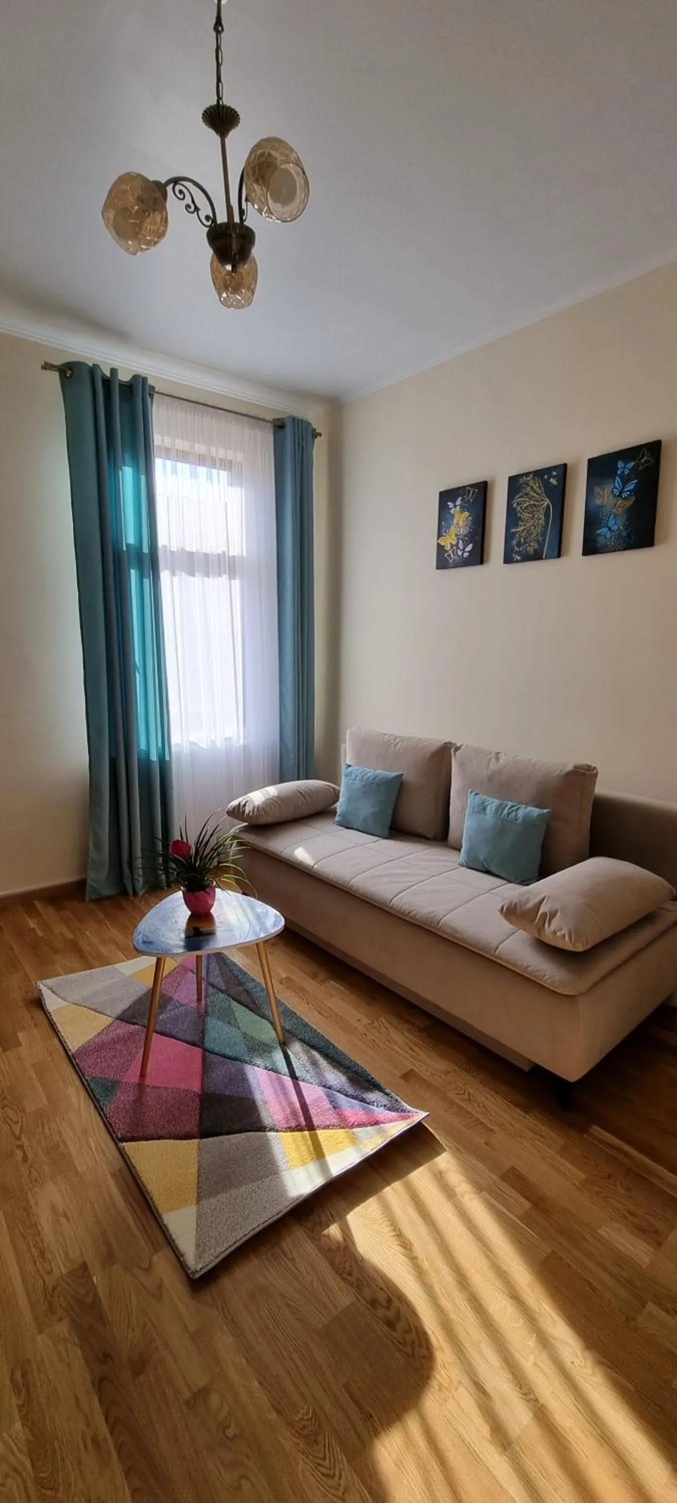 Living room in Happy Mood Apartments