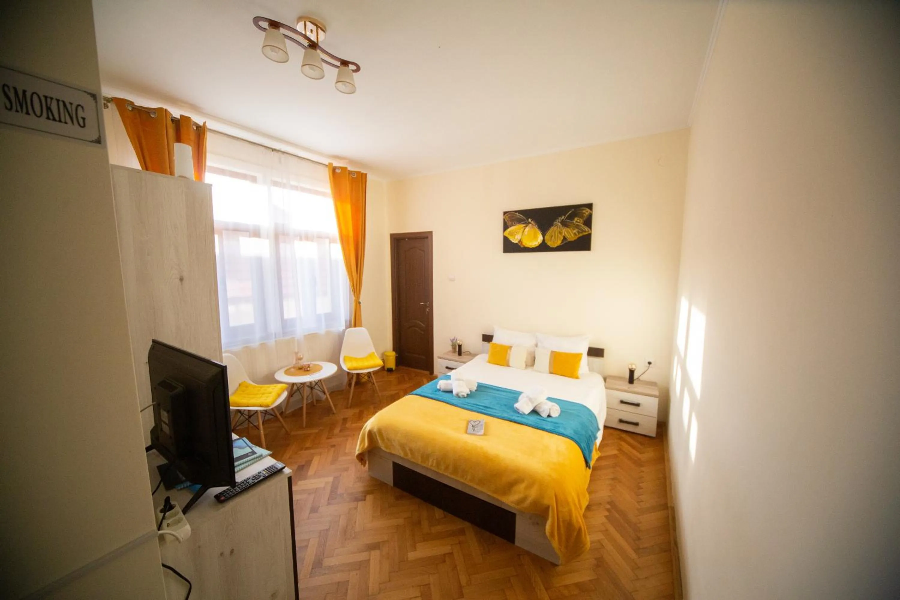 Bed in Happy Mood Apartments