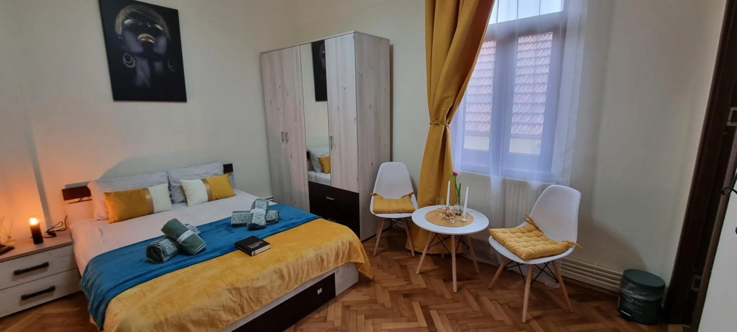 Bed in Happy Mood Apartments