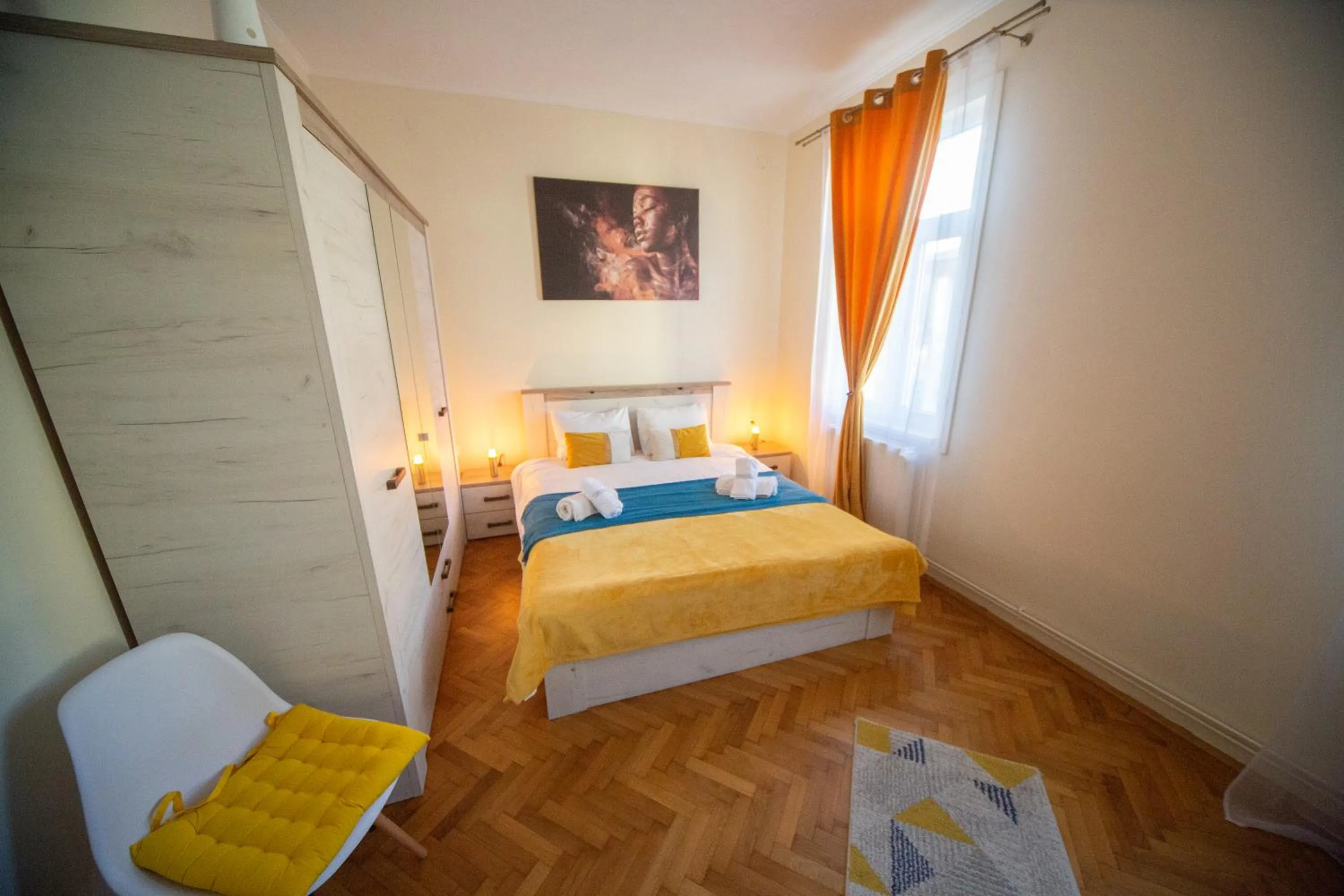 Bed in Happy Mood Apartments